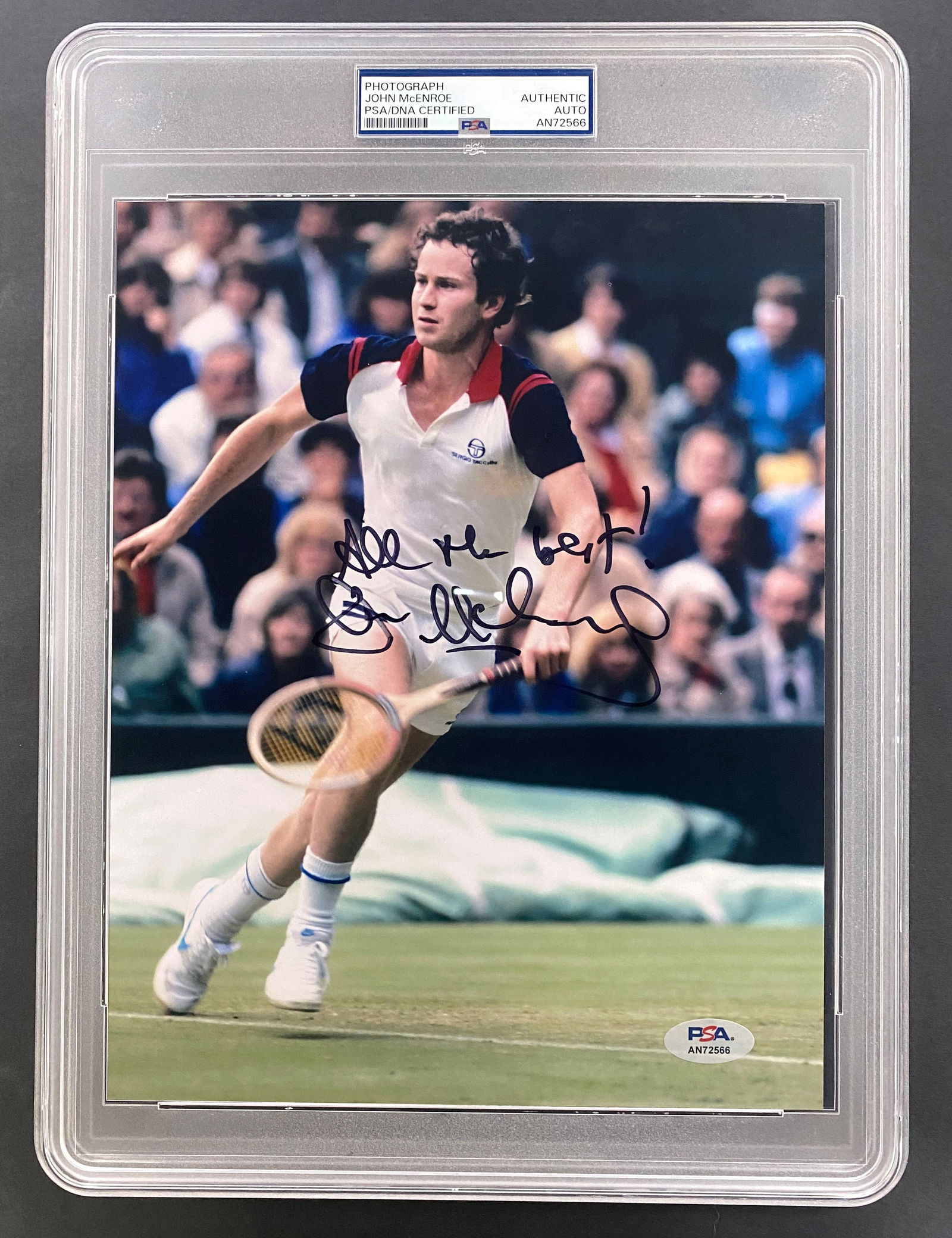 John McEnroe – Tennis Champion – Autographed 8 x 10 Photo: Details: John McEnroe autographed 8 x 10” color action photograph depicting the legendary tennis star mid–two-handed backhand during match play, captured in his prime competitive years. Bo