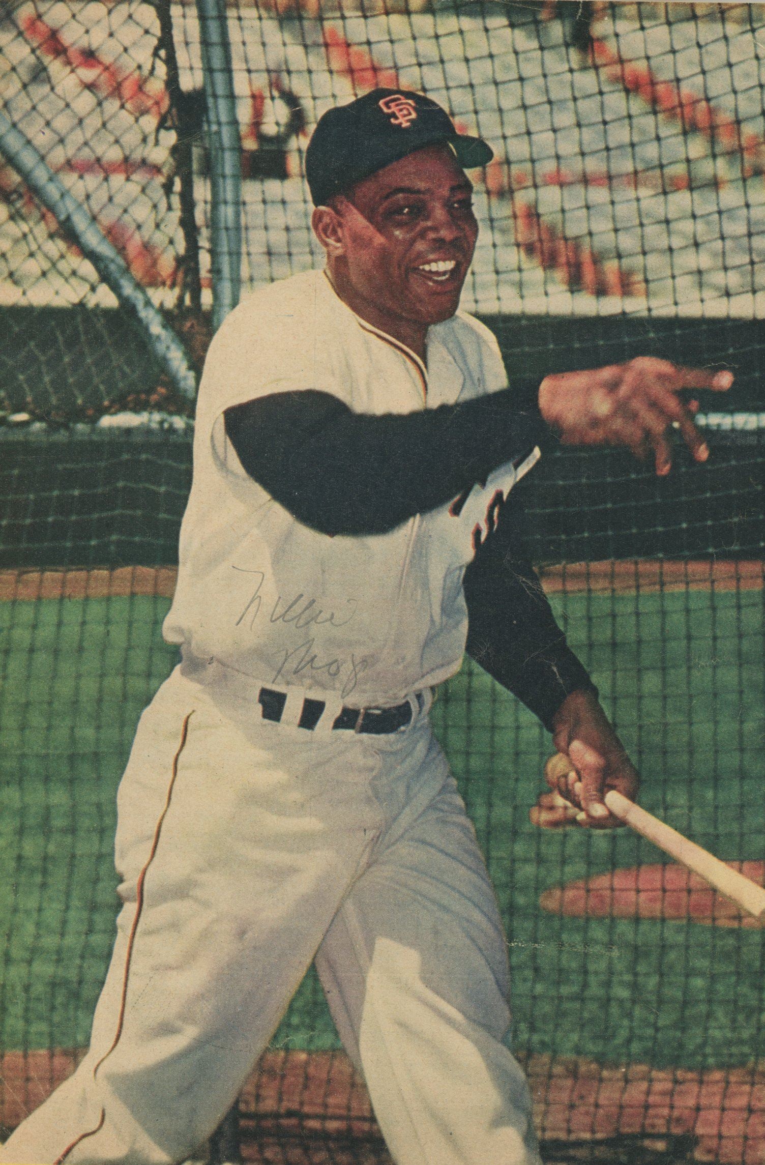 Willie Mays – San Francisco Giants Hall of Famer – Early Career Vintage Autographed Maga: Details: Willie Mays autographed vintage magazine page photograph measuring approximately 6.5 x 9.5 inches. The image shows Mays in uniform during batting practice, captured in an early-career pose.
