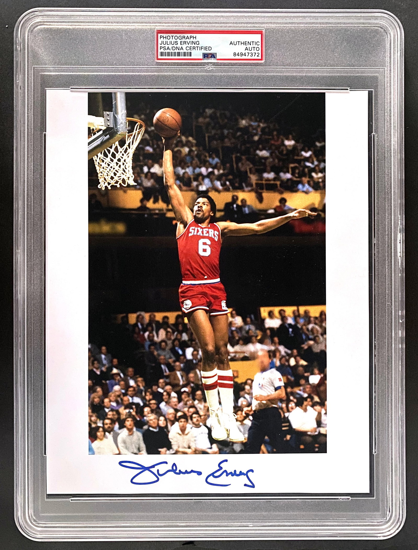 Julius “Dr. J” Erving – NBA Legend – Autographed 8 x 10 Photograph: Details: Julius “Dr. J” Erving autographed 8 x 10” color action photograph depicting the Hall of Fame forward soaring toward the basket in his Philadelphia 76ers uniform, jersey