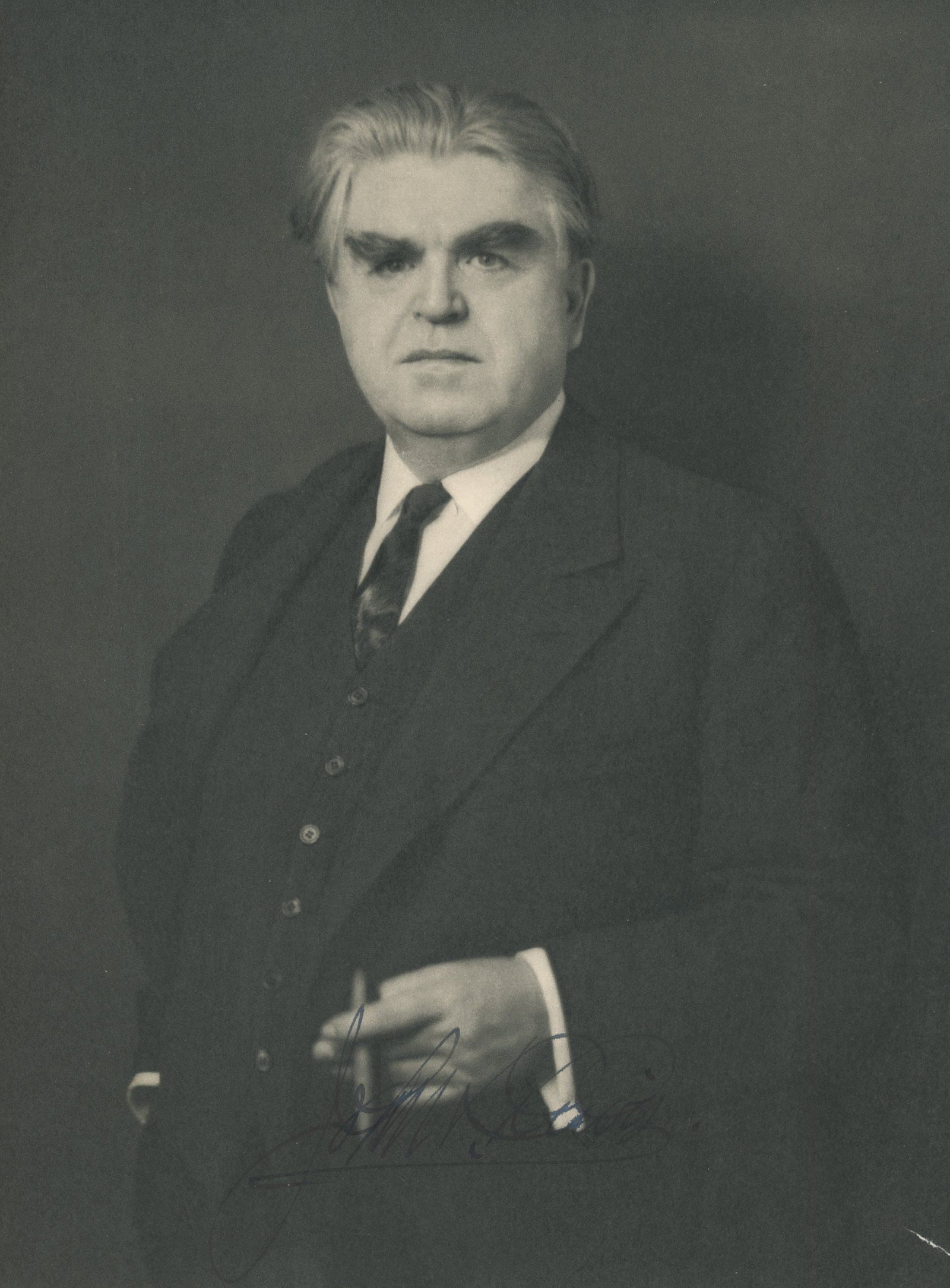 John L. Lewis – United Mine Workers of America President – Autographed Photograph –: Details: John L. Lewis autographed 8.5 x 11" photograph depicting the influential labor leader in a formal portrait. The photograph is boldly signed along the lower margin. Accompanying the