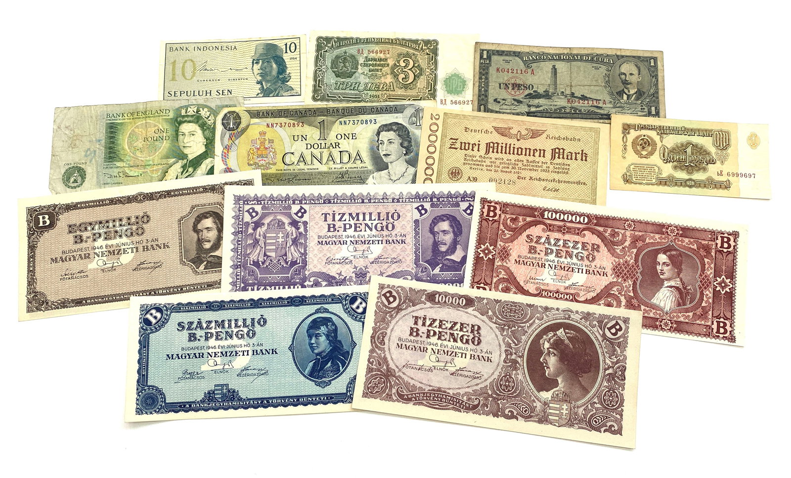 World Currency Collection – Mixed International Banknotes – Lot of 12: Details: World currency collection consisting of 12 banknotes representing a range of countries and historical monetary issues, including notable hyperinflation-era Hungarian pengő notes. Fine co