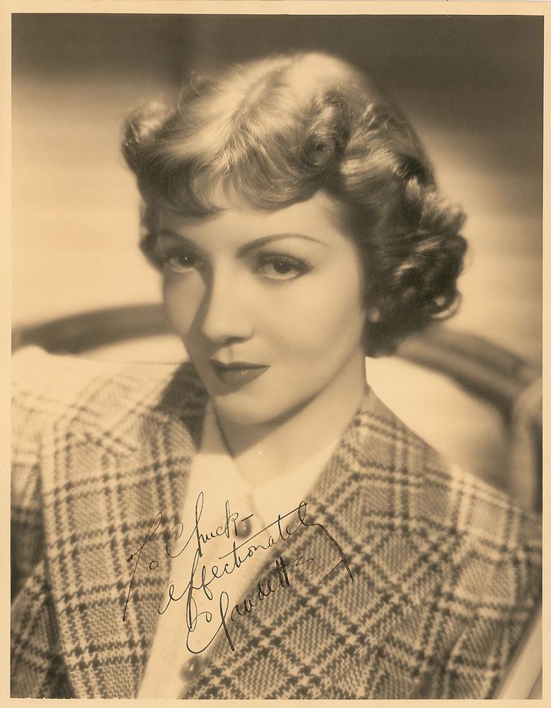 Claudette Colbert – Academy Award Winner – Autographed 11 x 14 Photograph: Details: Claudette Colbert autographed 11 x 14” vintage matte-finish photograph depicting a striking studio portrait of the actress with her signature sultry gaze. Boldly signed and inscribed in