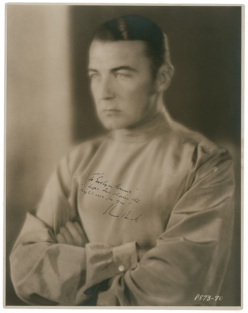 Clive Brook – British Film Actor – Autographed 11 x 14 Photograph – Inscribed Port: Details: Clive Brook autographed 11 x 14” vintage matte-finish sepia photograph depicting a refined studio portrait of the actor with arms folded in a classic pose. Boldly signed and inscribed i