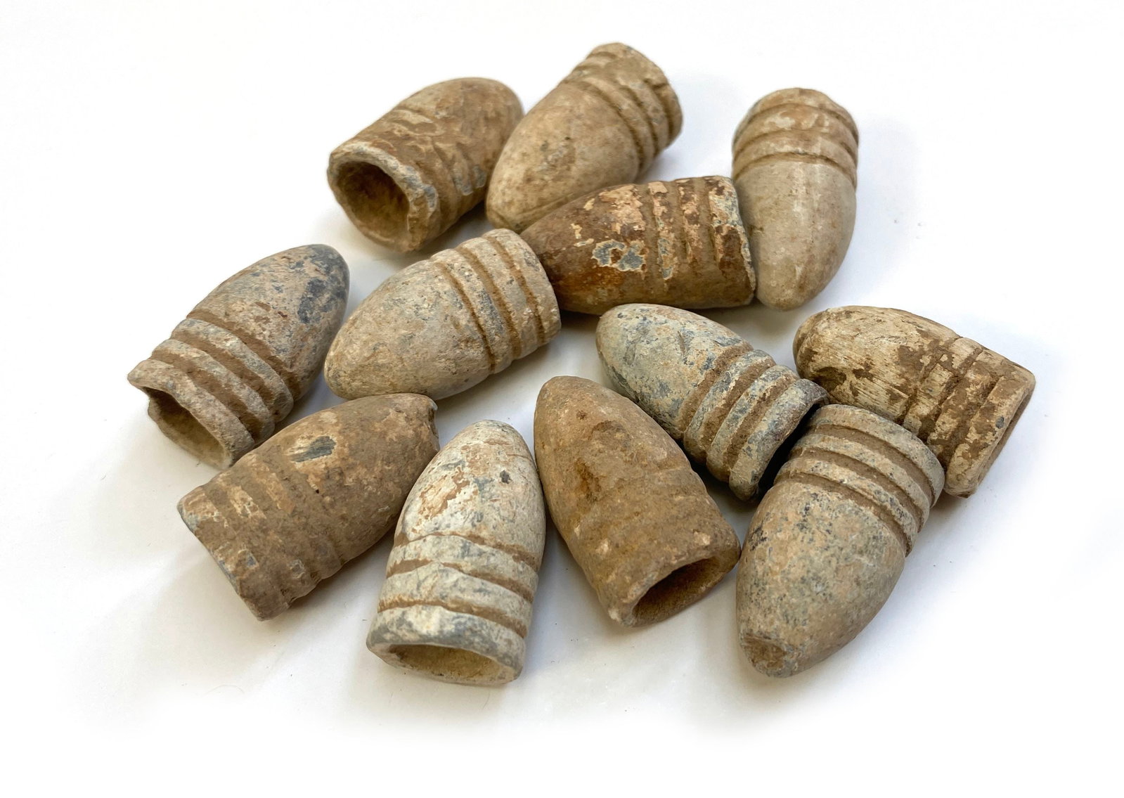 Civil War - Group of Twelve Dropped Minié Balls (1 of 1)