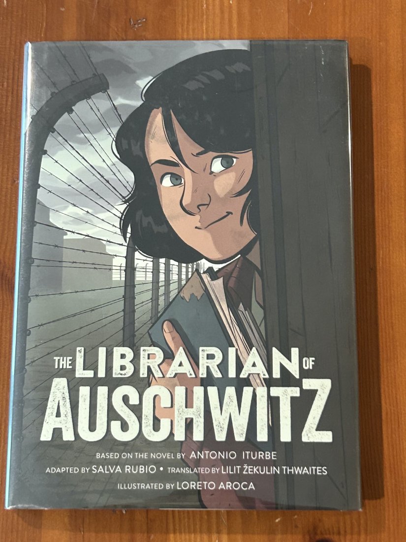 The Librarian Of Auschwitz Adapted by Salva Rubio First Edition: The Librarian Of Auschwitz Based On The Novel By Antonio Iturbe Adapted by Salva Rubio First Edition published by Henry Holt, New York, 2022. Illustrated by Loreto Aroca.