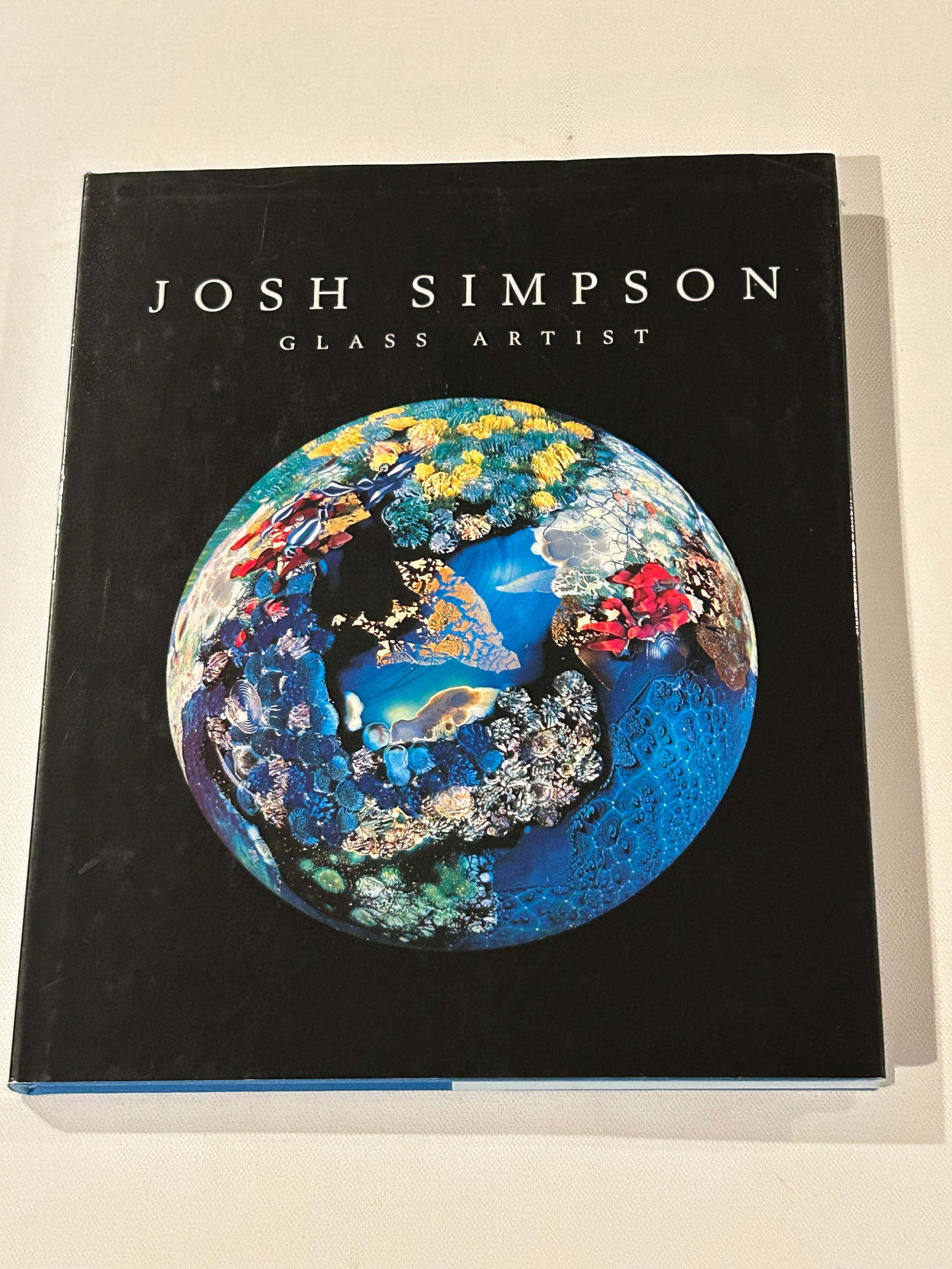 Josh Simpson Glass Artist by Andrew Chaikin SIGNED by Josh Simpson Second Printing: Josh Simpson Glass Artist by Andrew Chaikin SIGNED by Josh Simpson Second Printing published by Guild Publishing, Madison, 2001. Dimensions: 13" x 10" x 2"