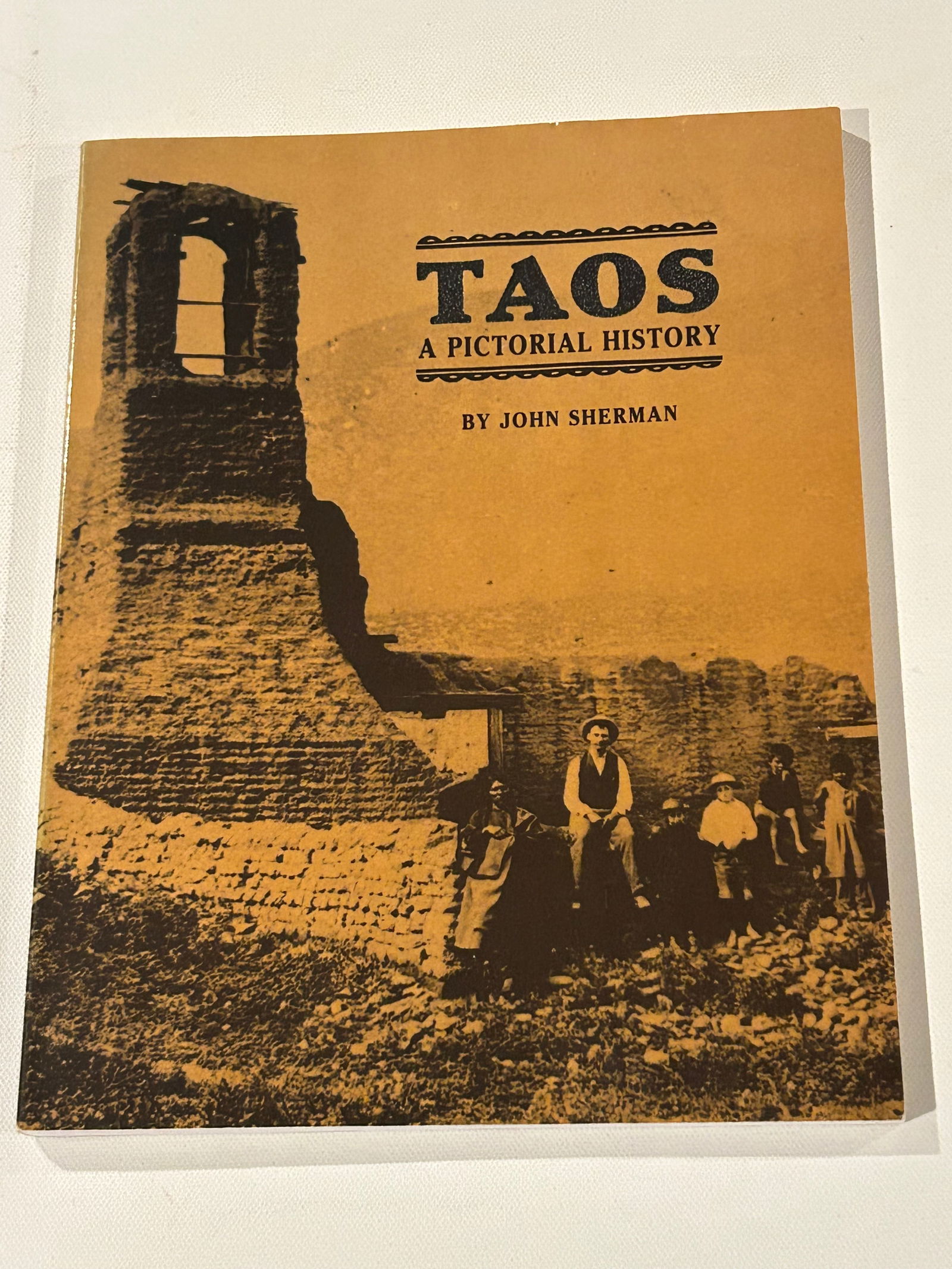 Taos A Pictorial History by John Sherman SIGNED & inscribed First Edition: Taos A Pictorial History by John Sherman SIGNED & inscribed First Edition published by William Gannon, Santa Fe, 1990. Dimensions: 13" x 10" x 2"