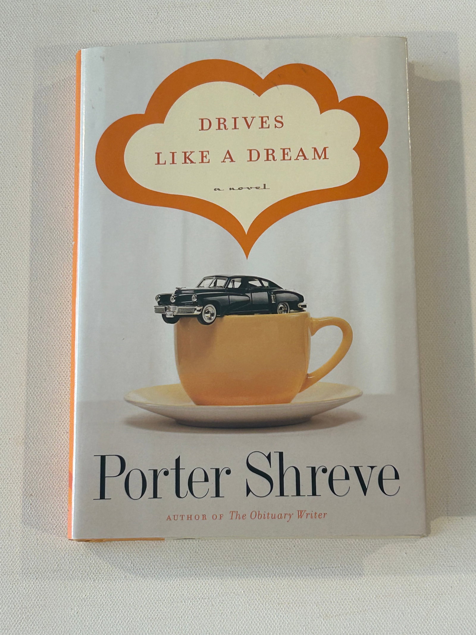 Drives Like A Dream by Porter Shreve SIGNED First Edition: Drives Like A Dream by Porter Shreve SIGNED First Edition published by Houghton Mifflin, New York, 2005. SIGNED Twice. Dimensions: 11" x 9" x 3"
