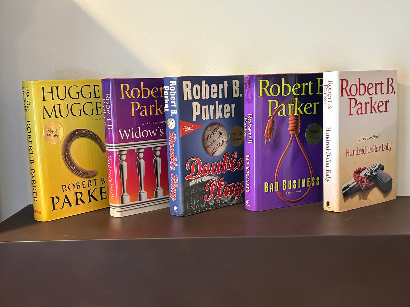 Robert B. Parker SIGNED First Editions: Hugger Mugger, Widow's Walk, Double Play, Bad Business & Hundred-Dollar Baby SIGNED First Editions published by G. P. Putnam's Sons, New York, 2000, 2002, 2004, 2004, 2006 Dimensions: 11" x 9" x 8"