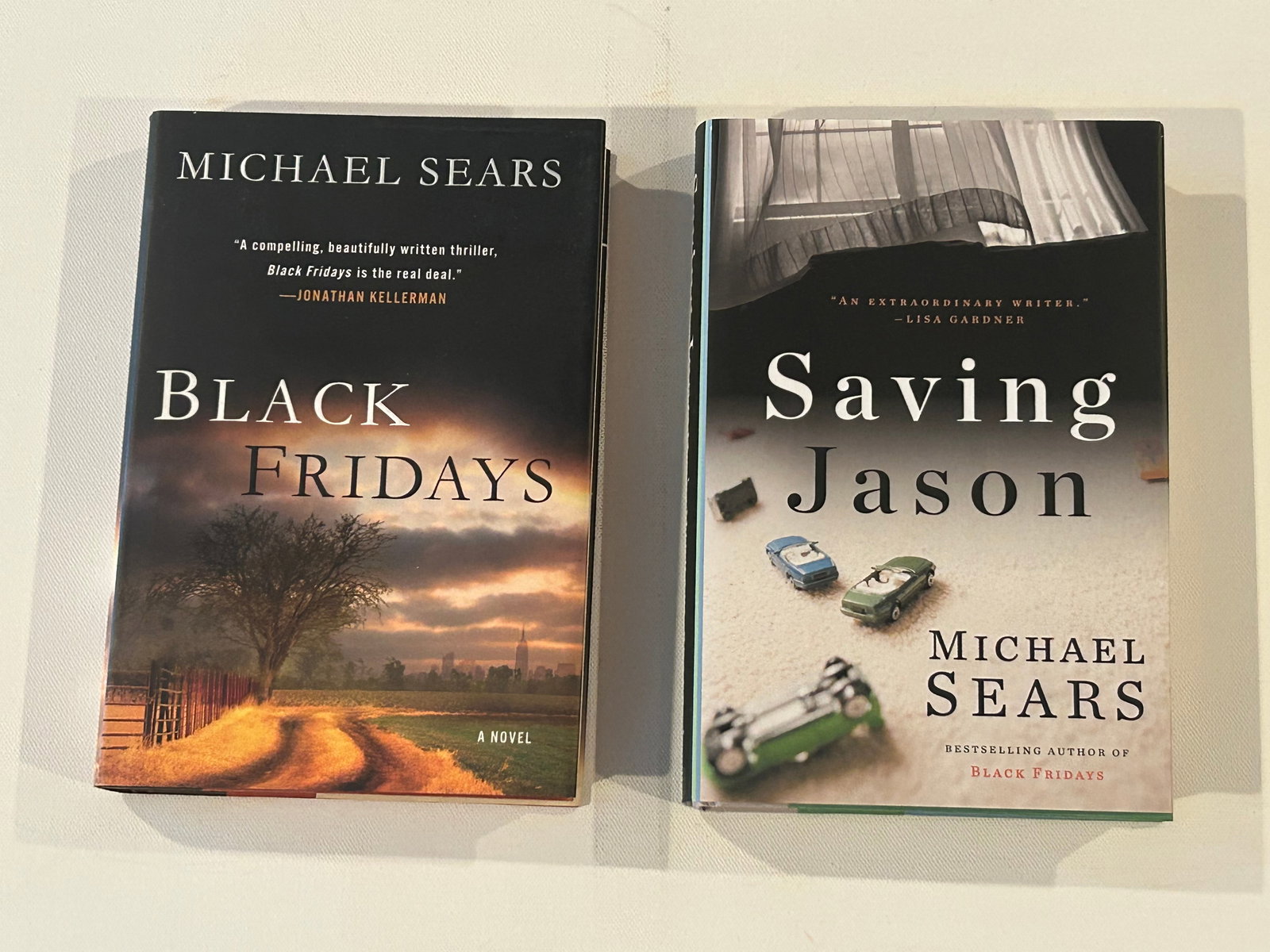 Michael Sears SIGNED & inscribed First Editions: Black Fridays & Saving Jason SIGNED First Editions published by G. P. Putnam's Sons, New York, 2012, 2016. Dimensions: 11" x 9" x 8"