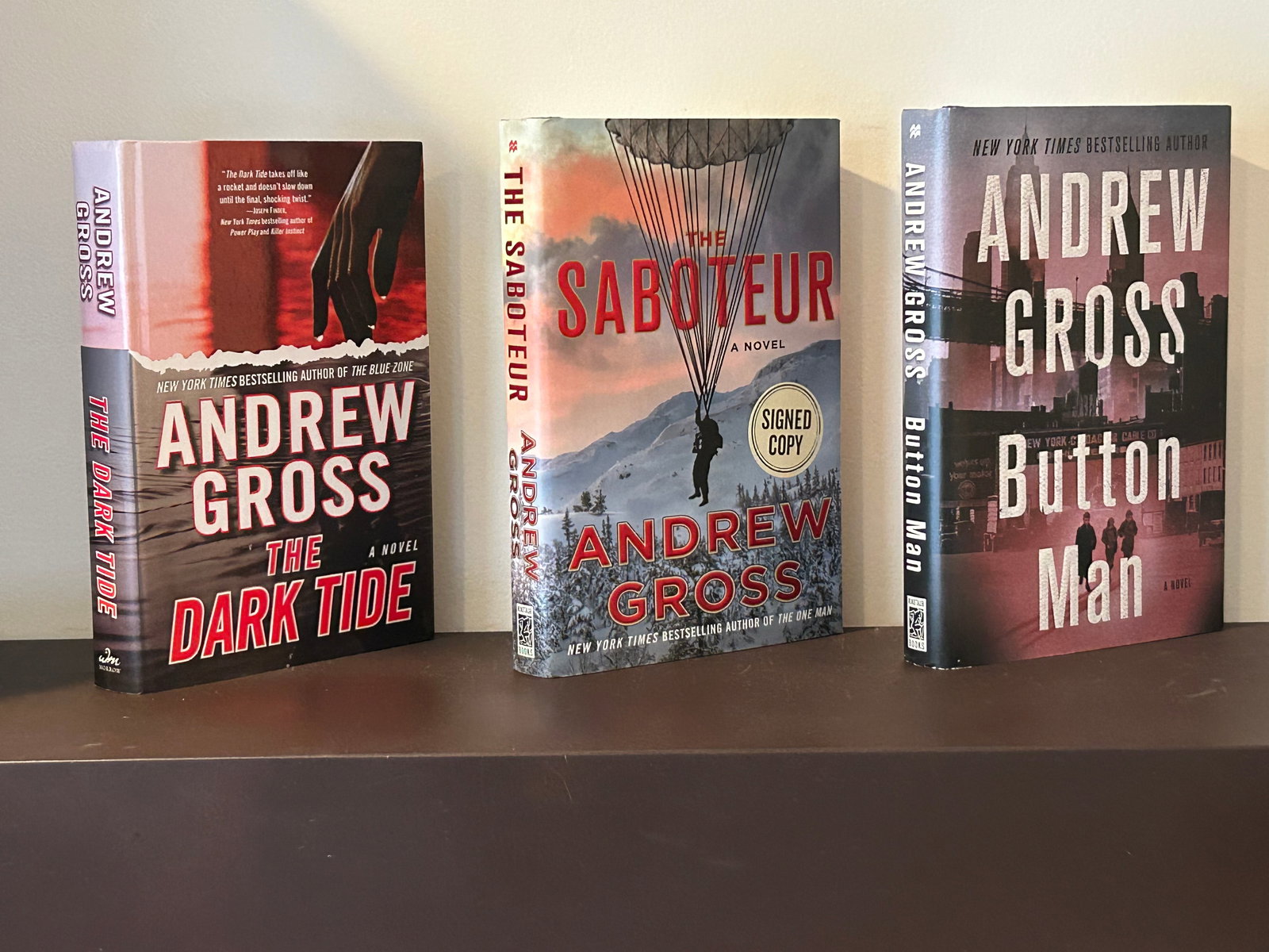 Andrew Gross SIGNED First Editions: The Dark Tide, The Saboteur & Button Man SIGNED First Editions published by William Morrow & Minotaur Books, New York, 2008, 2017, 2018. Dimensions: 11" x 9" x 12"