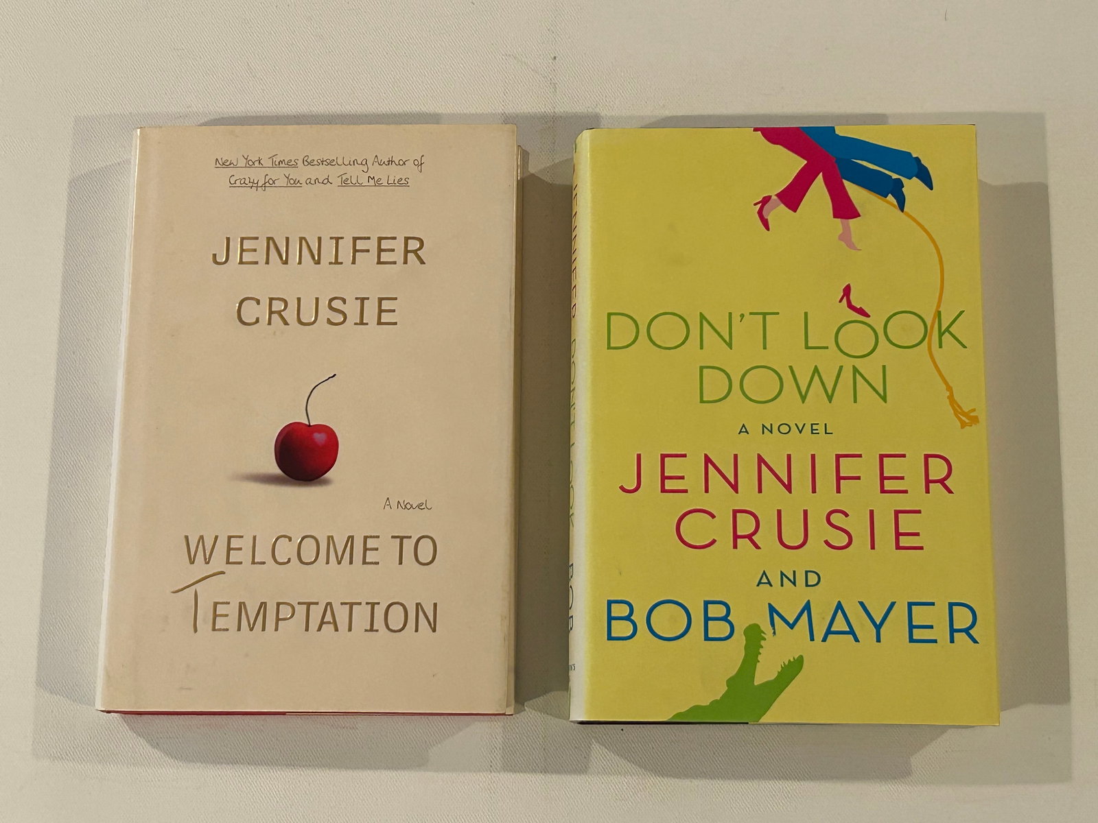 Jennifer Crusie SIGNED First Editions: Welcome To Temptation & Don't Look Down SIGNED First Editions published by St. Martin's Press, New York, 2000, 2006. Dimensions: 11" x 9" x 5"