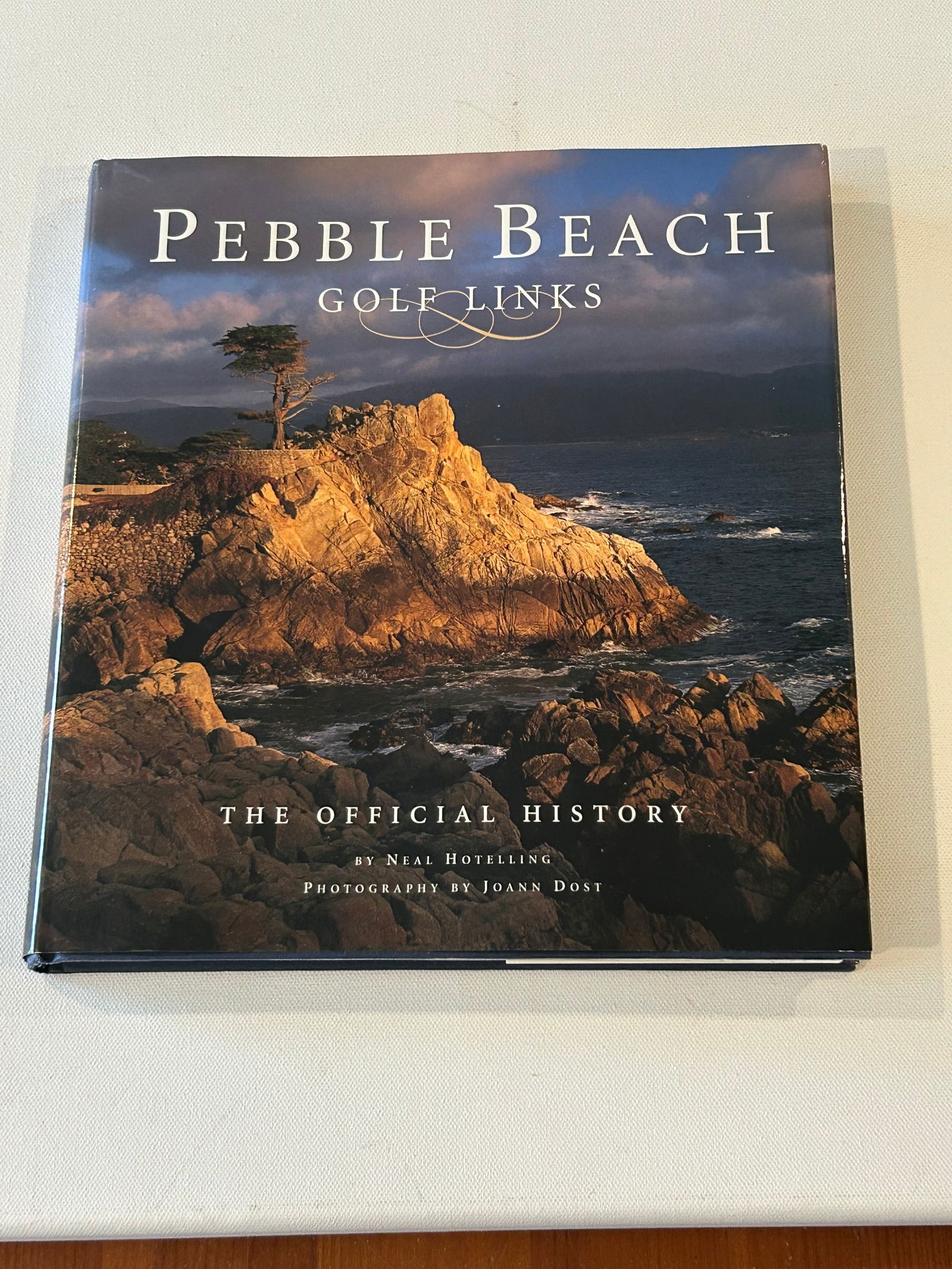 Pebble Beach Golf Links The Official History by Neal Hotelling SIGNED Later Printing: Pebble Beach Golf Links The Official History by Neal Hotelling SIGNED Later Printing With Second Illegible Inscriber published by Clock Tower Press, 1999 Dimensions: 11" x 9" x 8"