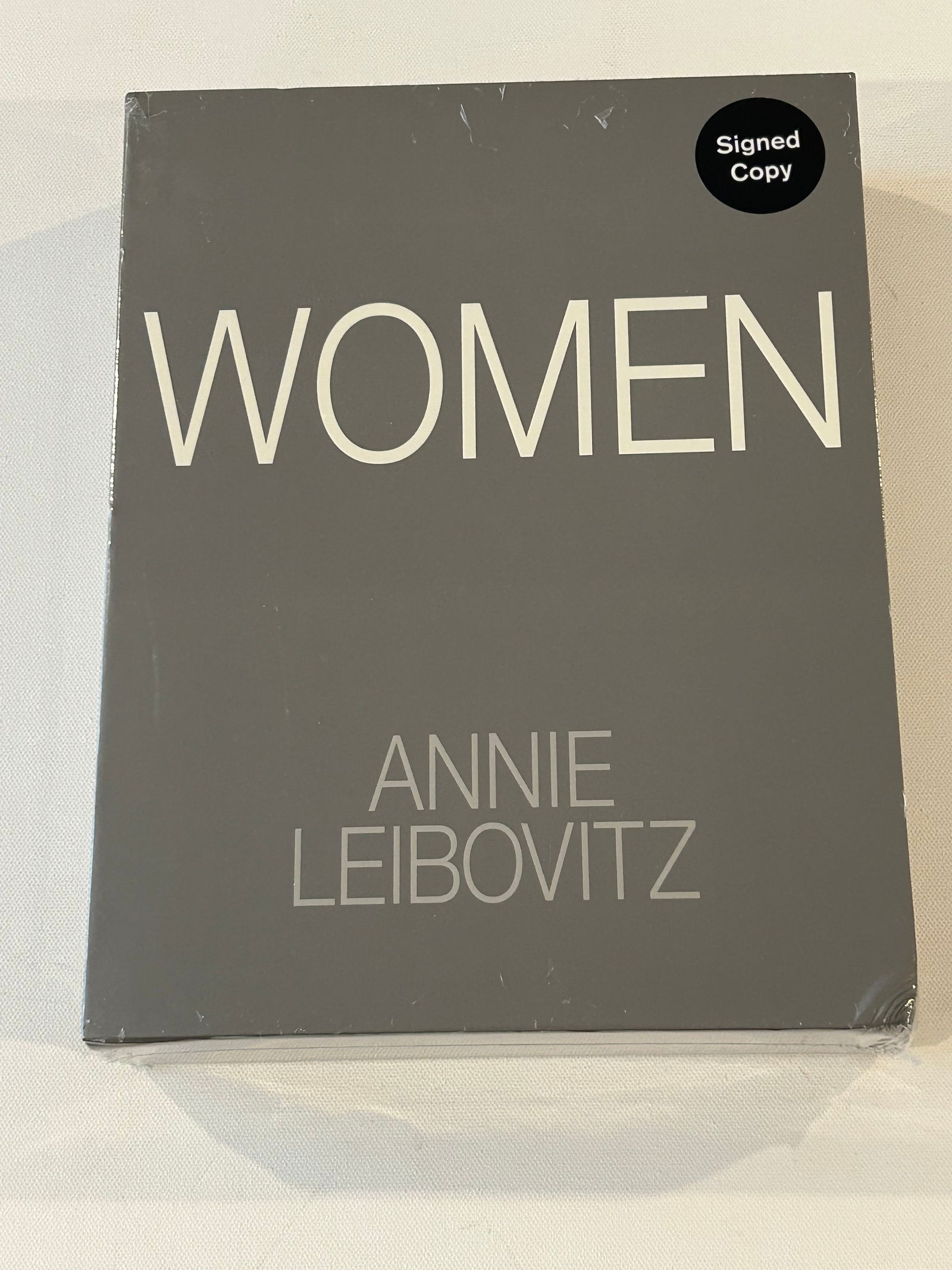 Women by Annie Leibovitz SIGNED Two VOLUME Slipcase Edition Still In Shrink-wrap: Women by Annie Leibovitz SIGNED Two VOLUME Slipcase Edition Still In Shrink-wrap published by Phaidon, New York, 2025. Dimensions: 24" x 12" x 3"