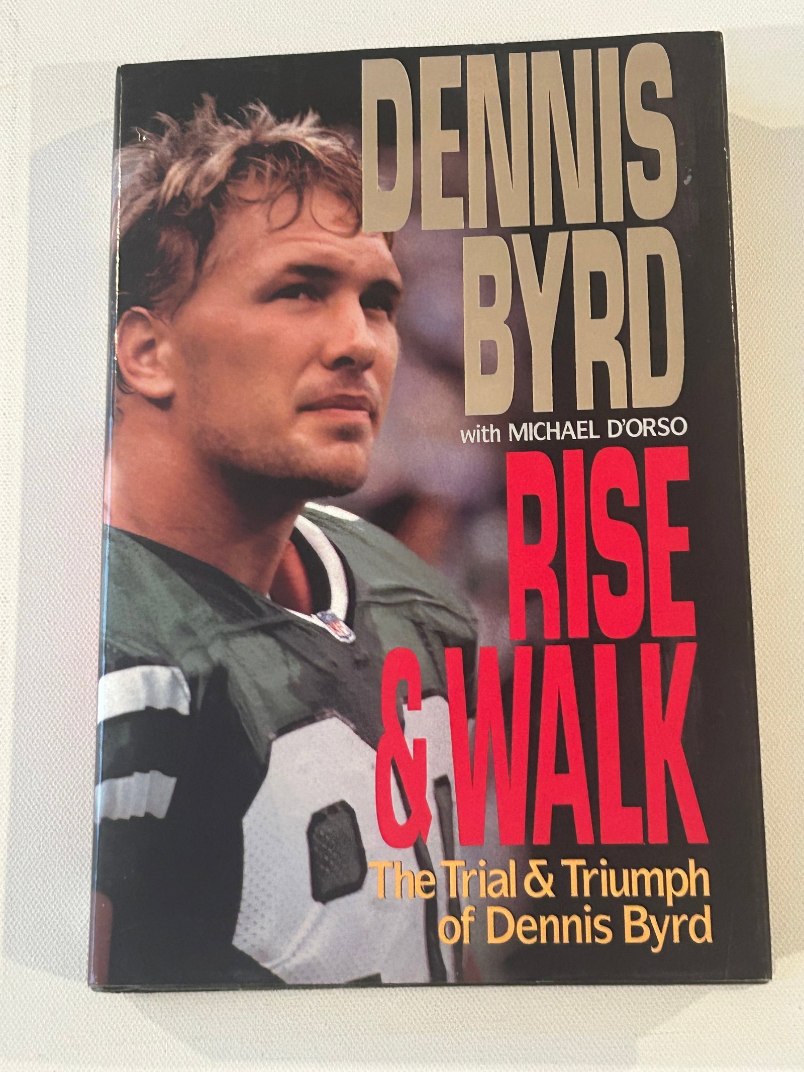 Rise & Walk by Dennis Byrd SIGNED First Edition: Rise & Walk by Dennis Byrd The Trial & Triumph Of Dennis Byrd SIGNED First Edition published by Harper Collins, New York, 1993. Dimensions: 11" x 9" x 3"