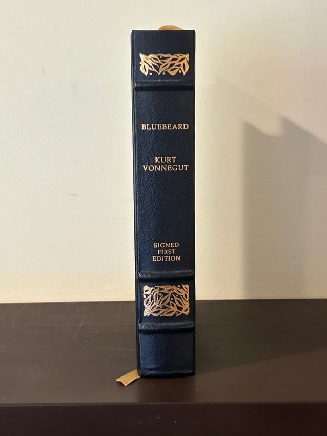 Bluebeard by Kurt Vonnegut SIGNED Leather Bound Limited First Edition: Bluebeard by Kurt Vonnegut SIGNED Leather Bound Limited First Edition published by The Franklin Library, Franklin Center, 1987. Dimensions: 11" x 7" x 3"