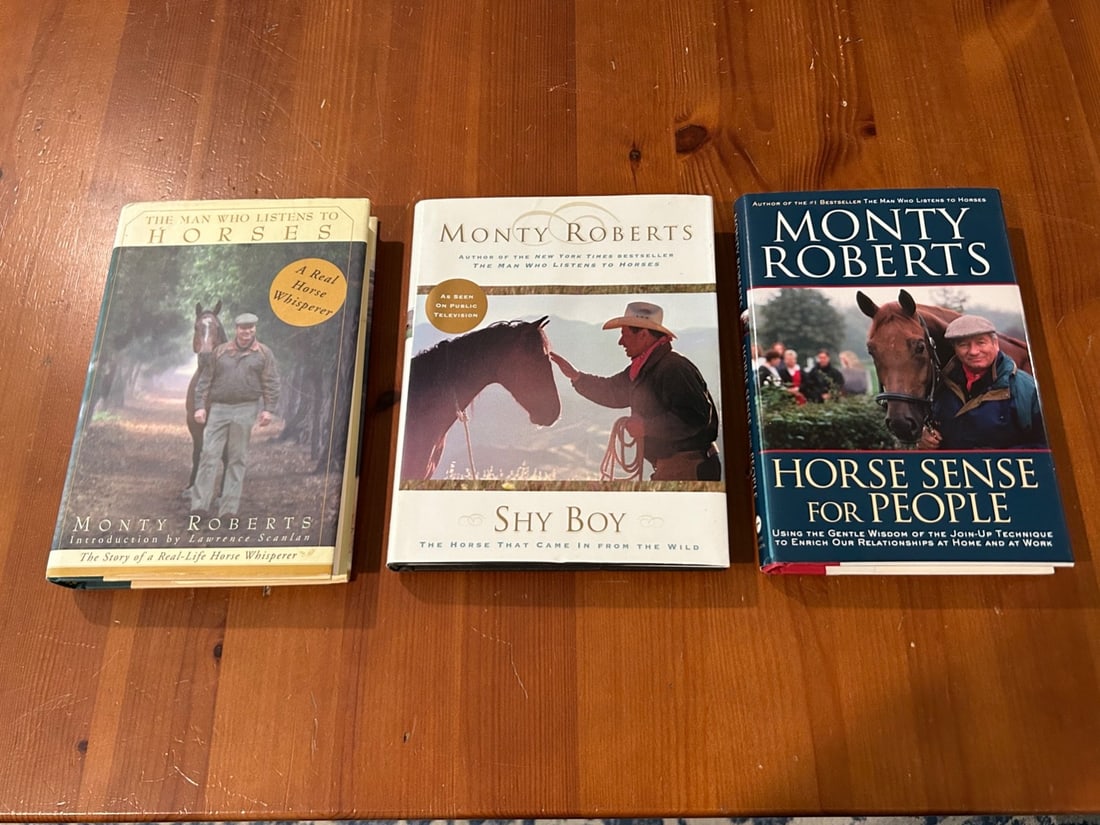 Monty Roberts SIGNED Editions: The Man Who Listens To Horses by Monty Roberts SIGNED Later Printing Published by Random House New York, 1996, 1997. Shy Boy The Horse That Came In From The Wild by Monty Roberts SIGNED & Inscribed Fi