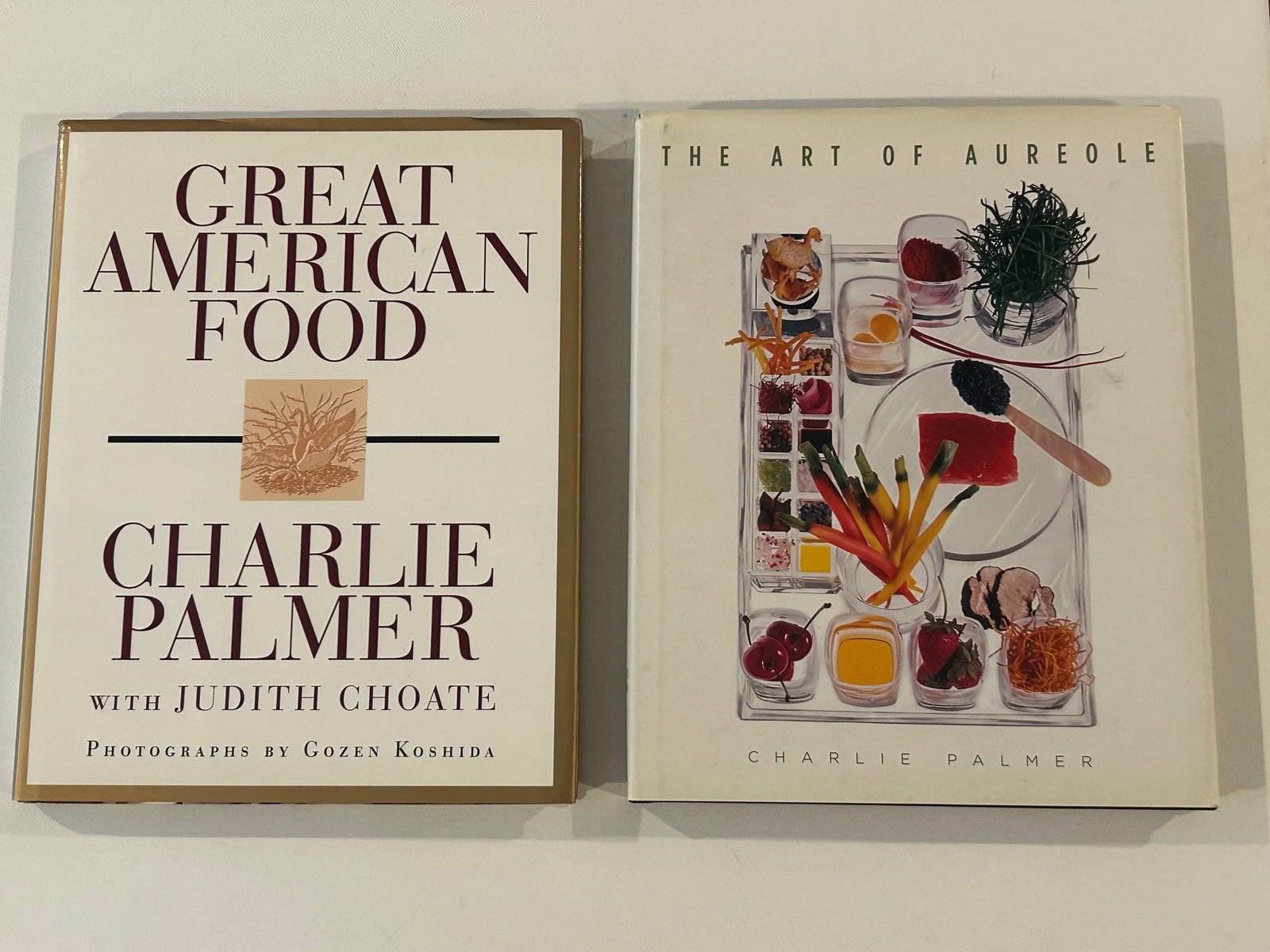 (NYC Food) Charlie Palmer SIGNED First Editions: The Art Of Aureole & Great American Food SIGNED First Editions published by Ten Speed Press & Random House, Berkley & New York 2003& 1996. Dimensions: 14 x 12" x 4".