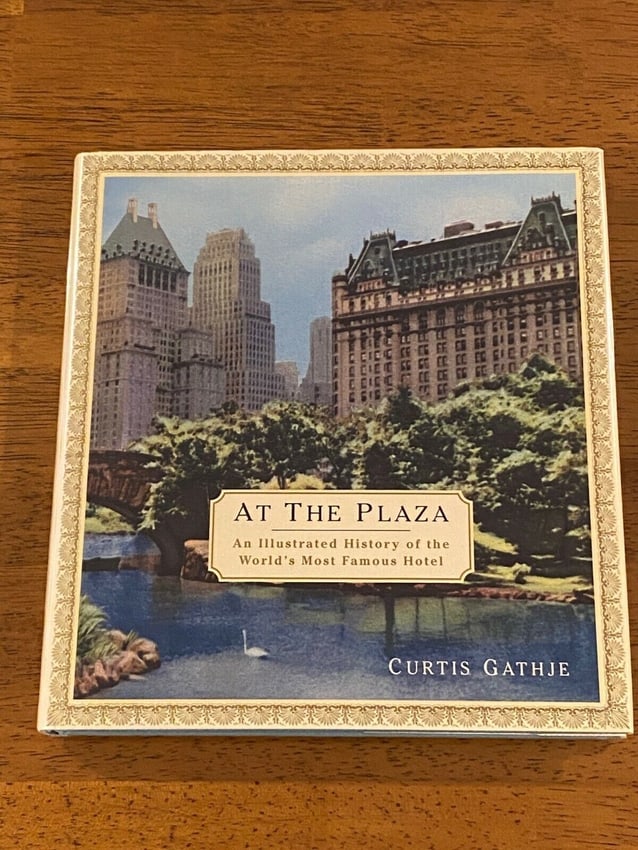 (NYC Places) At The Plaza By Curtis Gathje SIGNED & Inscribed First Edition: At The Plaza An Illustrated History of the World's Most Famous Hotel by Curtis Gathje SIGNED & Inscribed First Edition Published by St. Martin's Press, New York, 2000. Dimensions: 12 x 9" x 2".