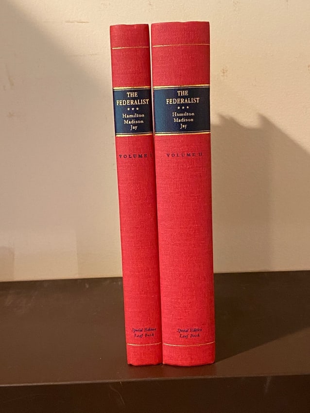 The Federalist Special Edition Leaf Book With Bound In Page From The 1788 First Edition #19/193: The Federalist by Alexander Hamilton, James Madison and John Jay RARE Special Edition Leaf Book With Bound In Page From The 1788 First Edition #19/193. Dimensions: 13" x 7" x 6"