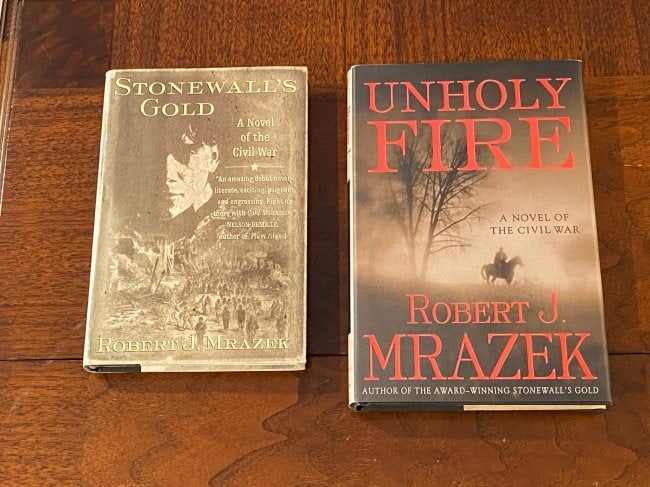 Stonewall's Gold & Unholy Fire By Robert J. Mrazek SIGNED First Editions: Stonewall's Gold & Unholy Fire By Robert J. Mrazek SIGNED First Editions published by St. Martin's Press, New York, 1999 & 2003. Dimensions: 11" x 9" x 3"