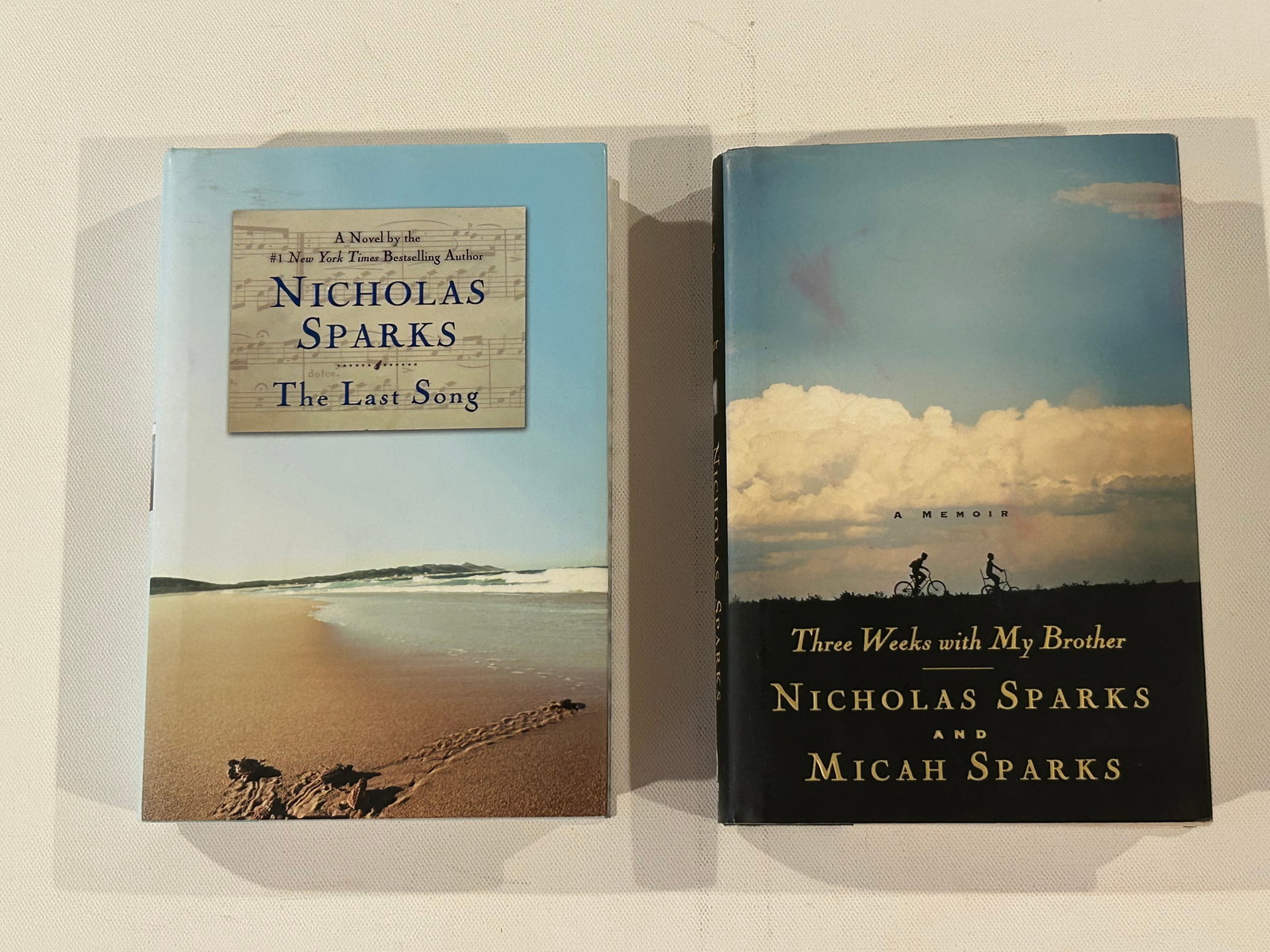 Nicholas Sparks SIGNED First Editions: Three Weeks With My Brother SIGNED & Inscribed First Edition by Nicholas & Micah Sparks published by Warner Books, New York, 2004 (tear to jacket) The Last Song SIGNED First Edition published by