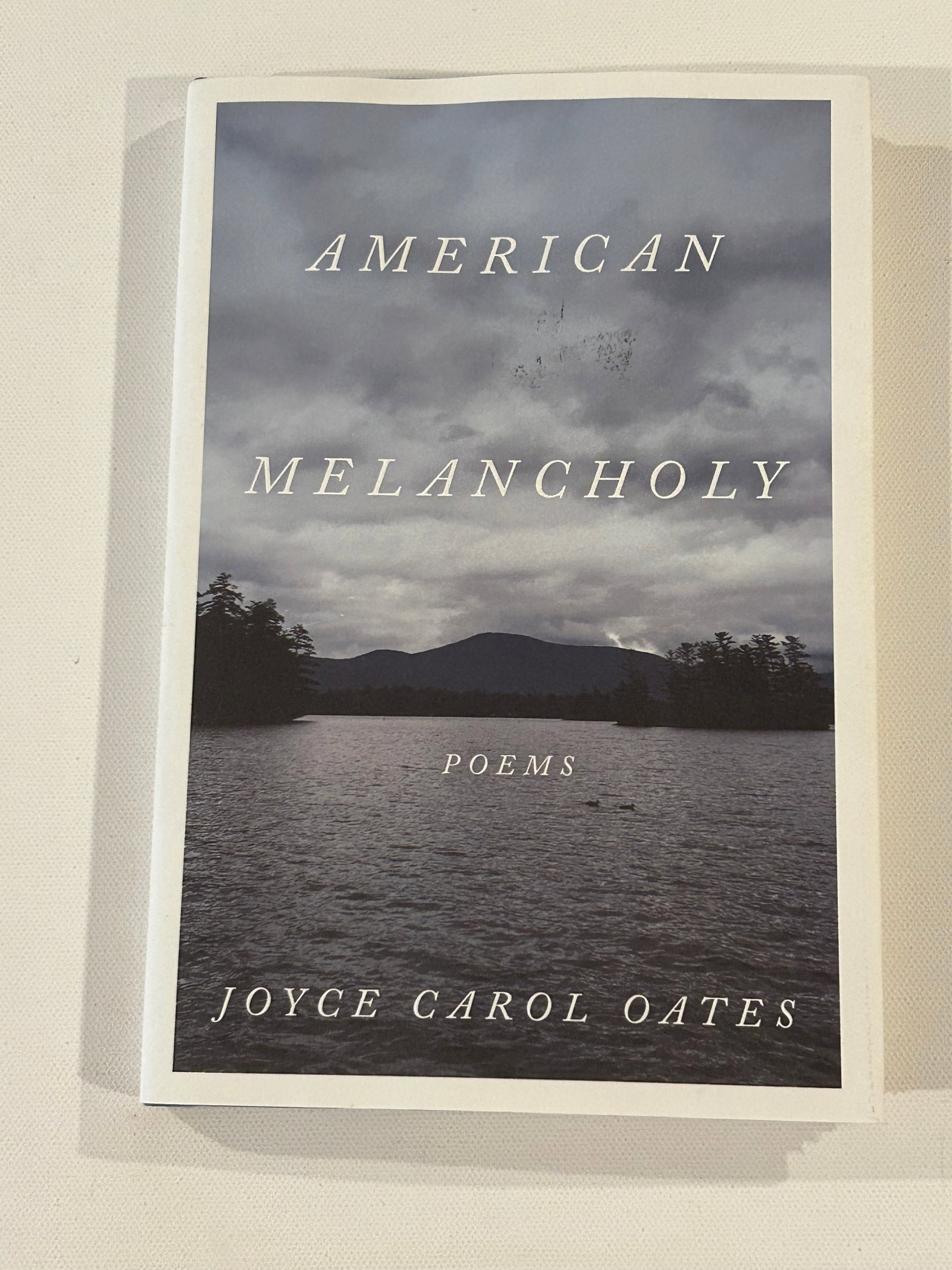 American Melancholy Poems by Joyce Carol Oates SIGNED First Edition: American Melancholy Poems by Joyce Carol Oates SIGNED First Edition published by Ecco, New York, 2021. Dimensions: 11" x 9" x 2"