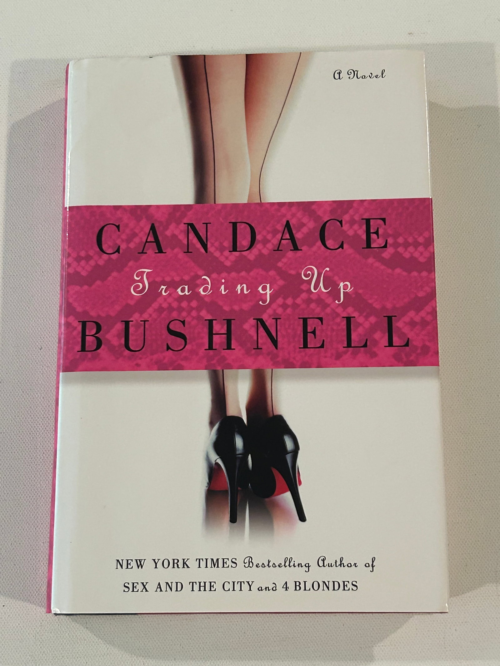 Trading Up by Candace Bushnell SIGNED & inscribed First Edition: Trading Up by Candace Bushnell SIGNED & inscribed First Edition published by Hyperion, New York, 2003. Dimensions: 11" x 9" x 2"