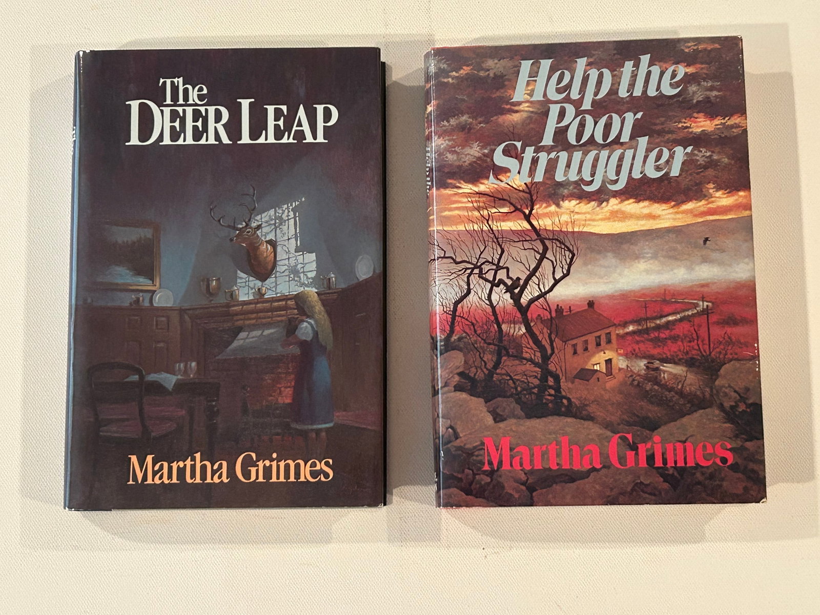 Martha Grimes SIGNED First Editions: The Deer Leap & Help The Poor Struggler by Martha Grimes SIGNED First Editions published by Little, Brown, Boston, 1985. Dimensions: 11" x 9" x 2"