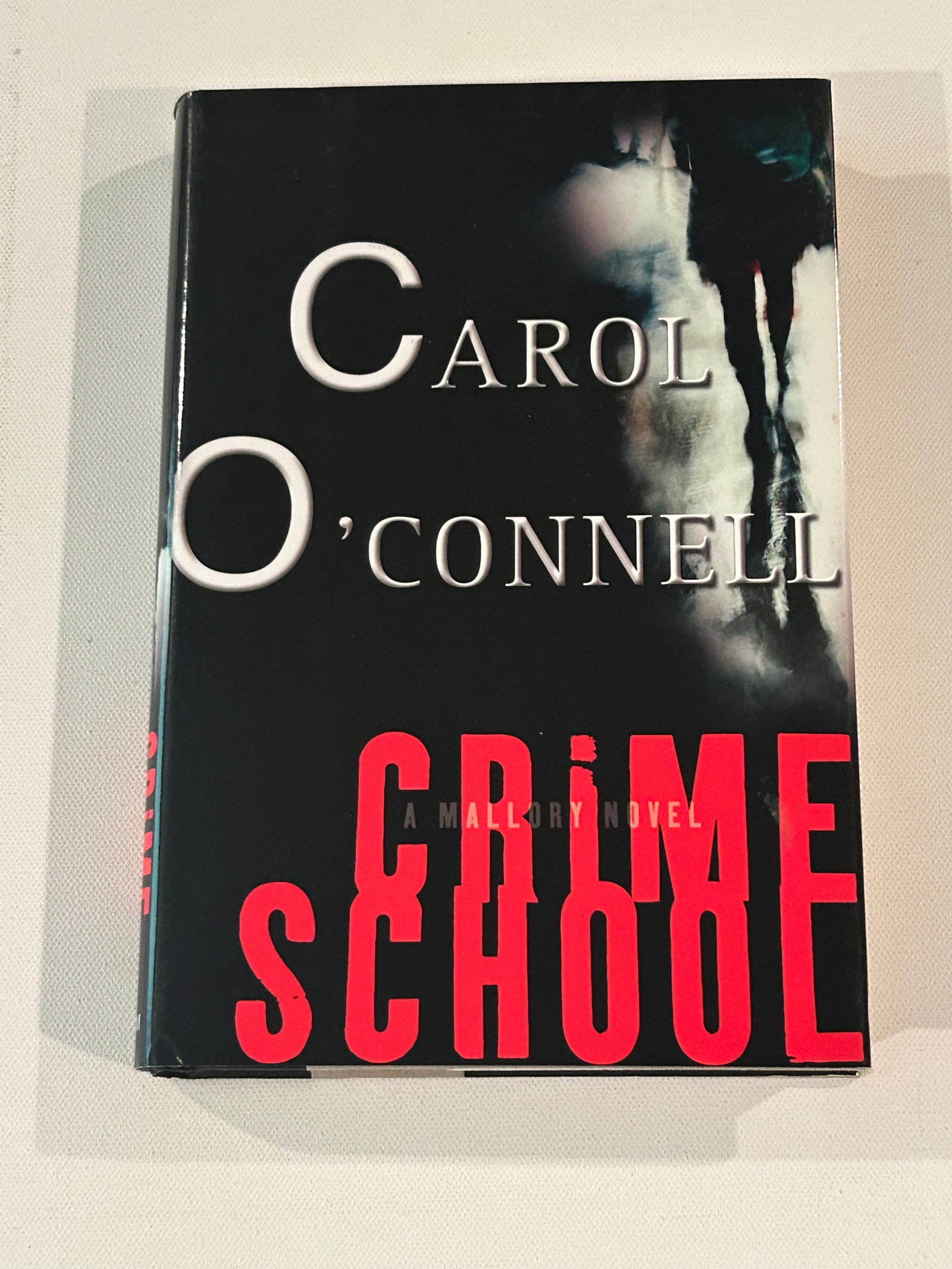 Crime School by Carol O'Connell SIGNED First Edition: Crime School by Carol O'Connell SIGNED First Edition published by G. P. Putnam's Sons, New York, 2002. Dimensions: 11" x 9" x 3"