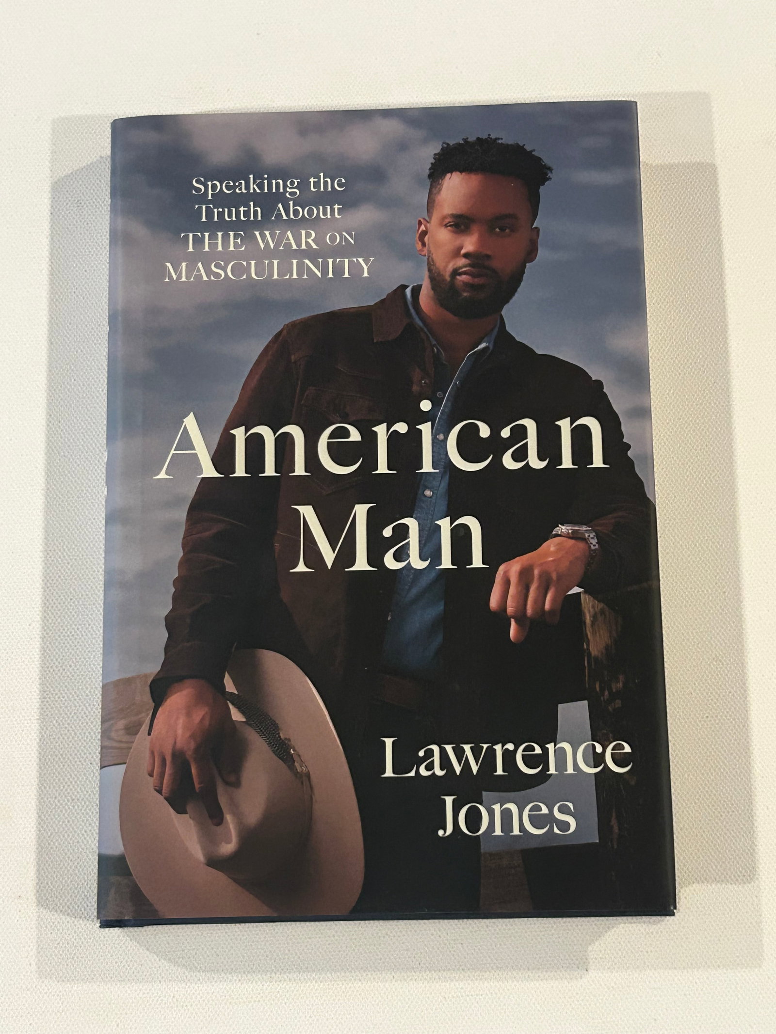 American Man by Lawrence Jones SIGNED First Edition: American Man by Lawrence Jones SIGNED First Edition published by Center Street, New York, 2023. Dimensions: 11" x 9" x 3