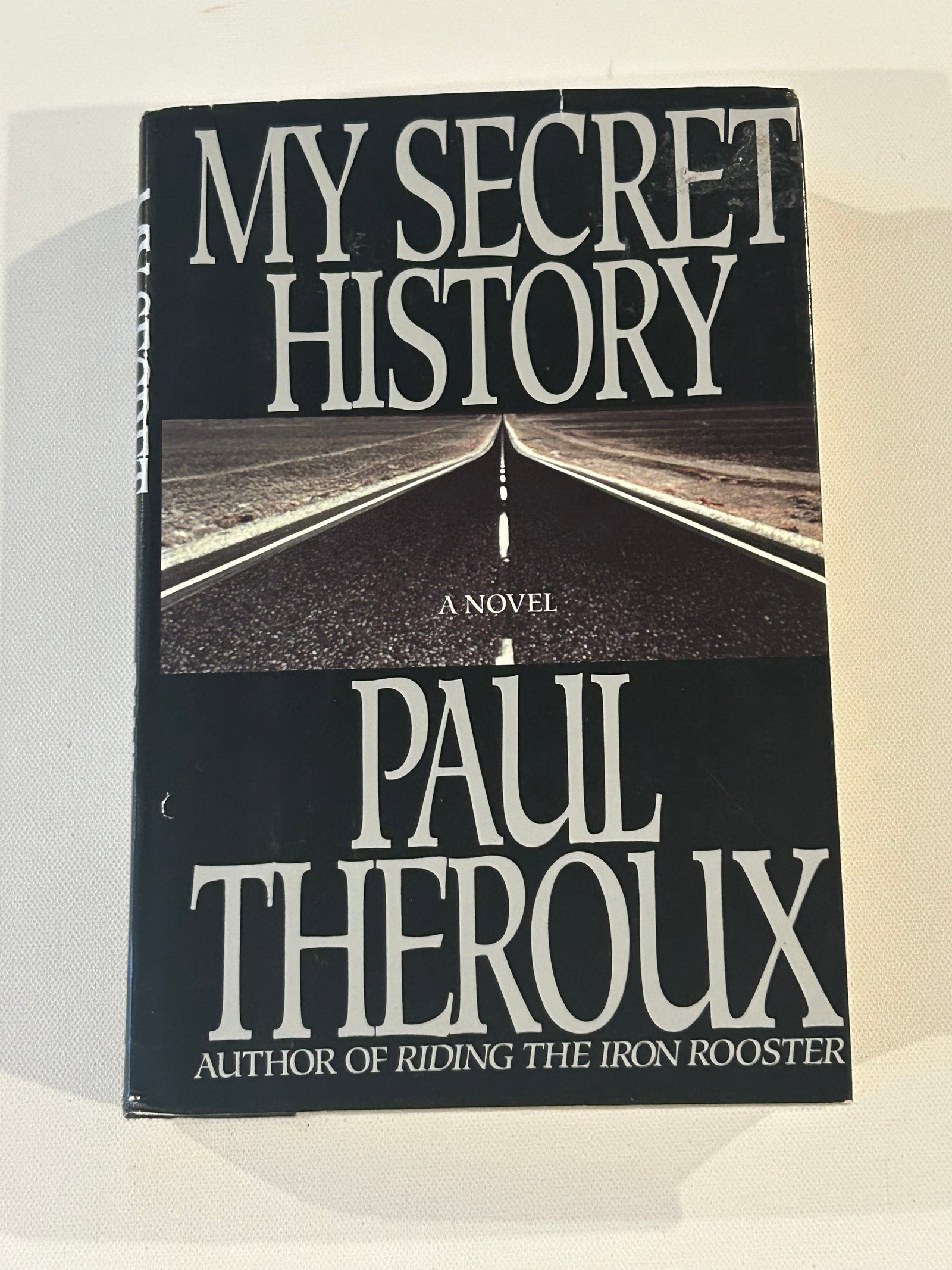My Secret History by Paul Theroux SIGNED & Inscribed First Edition: My Secret History by Paul Theroux SIGNED & Inscribed First Edition published by G.P. Putnam's Sons, New York, 1989. Dimensions: 11" x 9" x 3"
