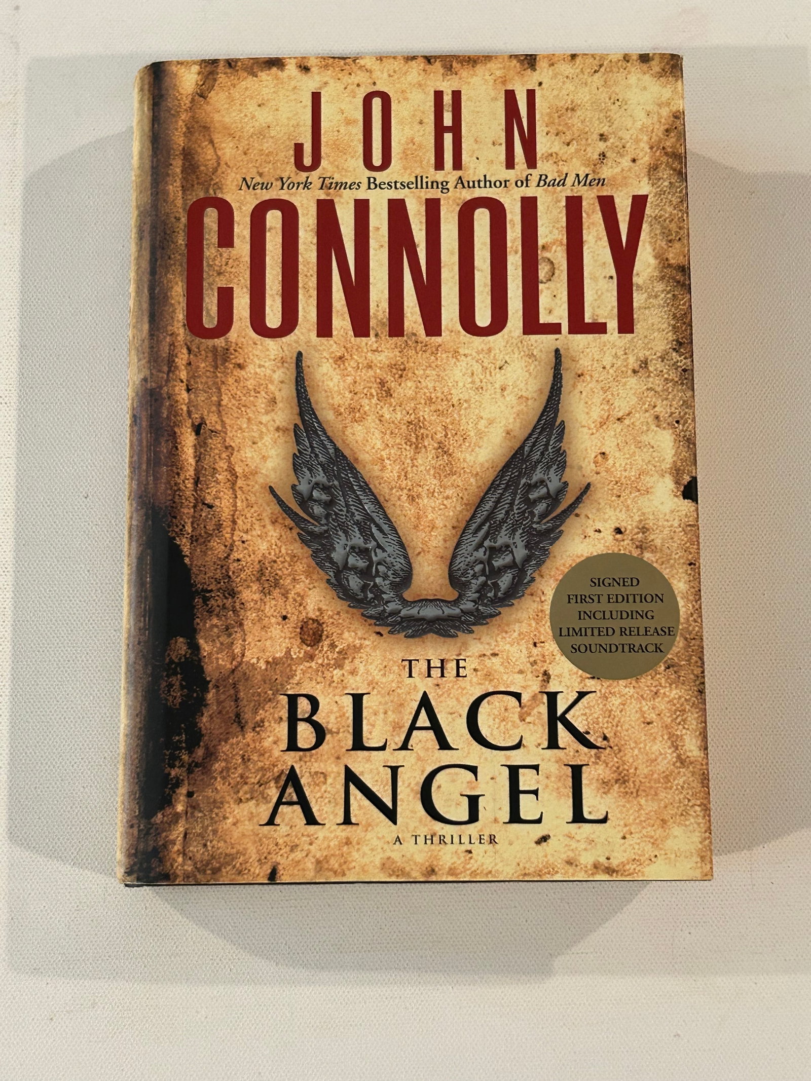 The Black Angel By John Connolly SIGNED First Edition: The Black Angel By John Connolly SIGNED First Edition with included CD published by Atria Books, New York, 2005. Dimensions: 11" x 9" x 3"