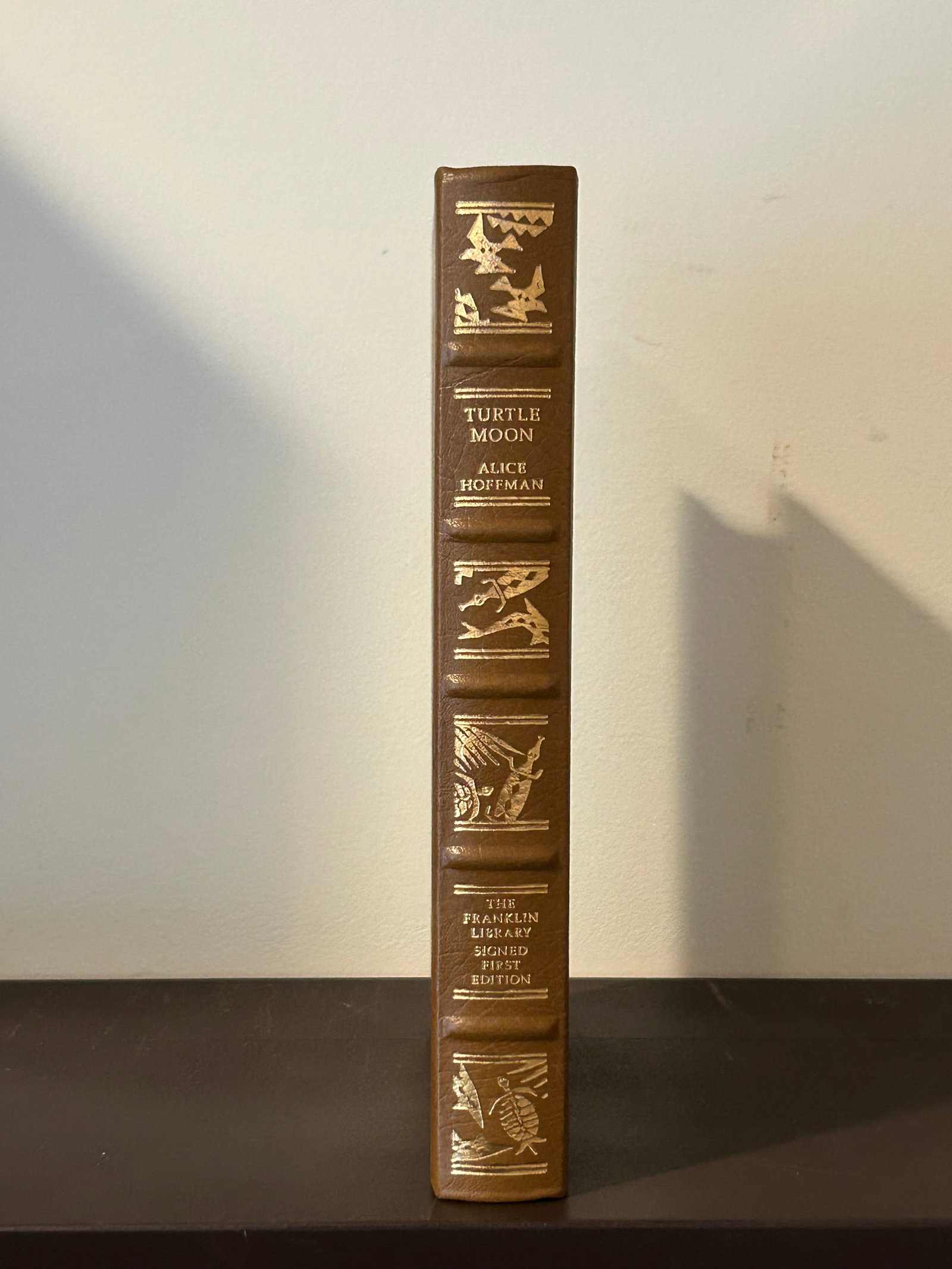 Turtle Moon by Alice Hoffman SIGNED Leather Bound Limited First Edition: Turtle Moon by Alice Hoffman SIGNED Leather Bound Limited First Edition published by The Franklin Library, Franklin Center, 1992. Dimensions: 11" x 9" x 3"