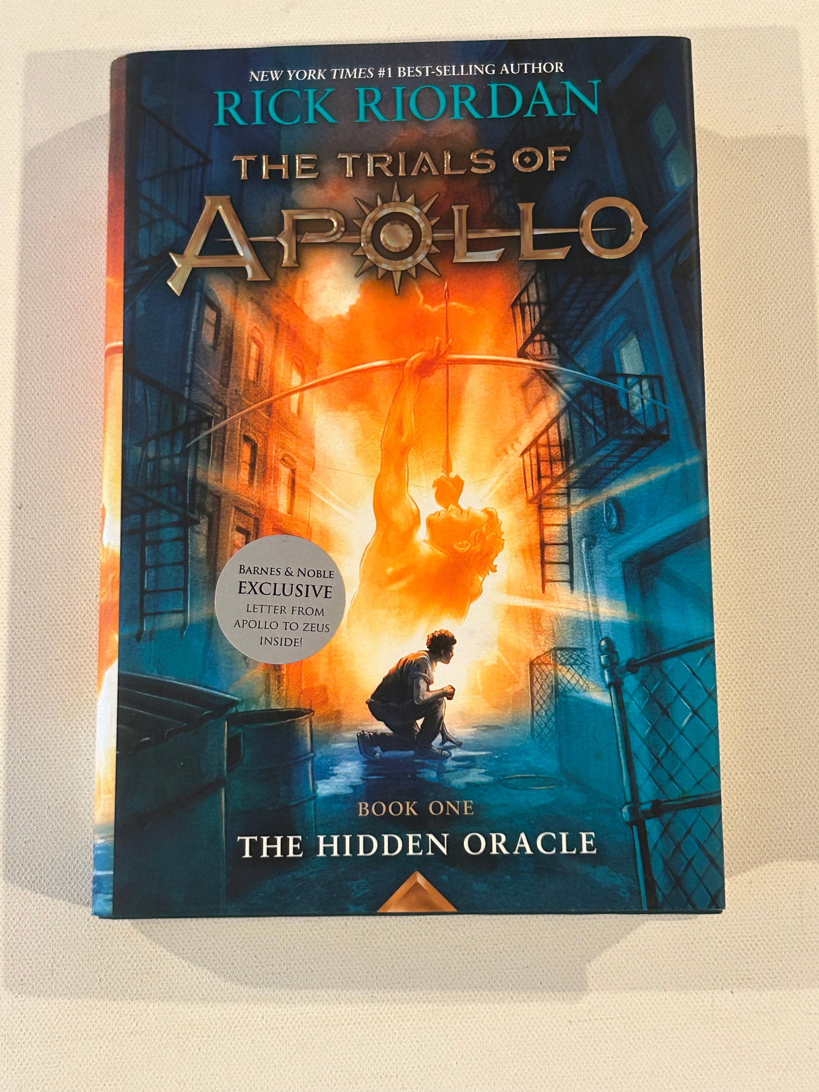 The Trials of Apollo The Hidden Oracle by Rick Riordan SIGNED First Edition: The Trials of Apollo The Hidden Oracle by Rick Riordan SIGNED First Edition published by Disney/Hyperion, New York, 2016. Dimensions: 11" x 9" x 3"