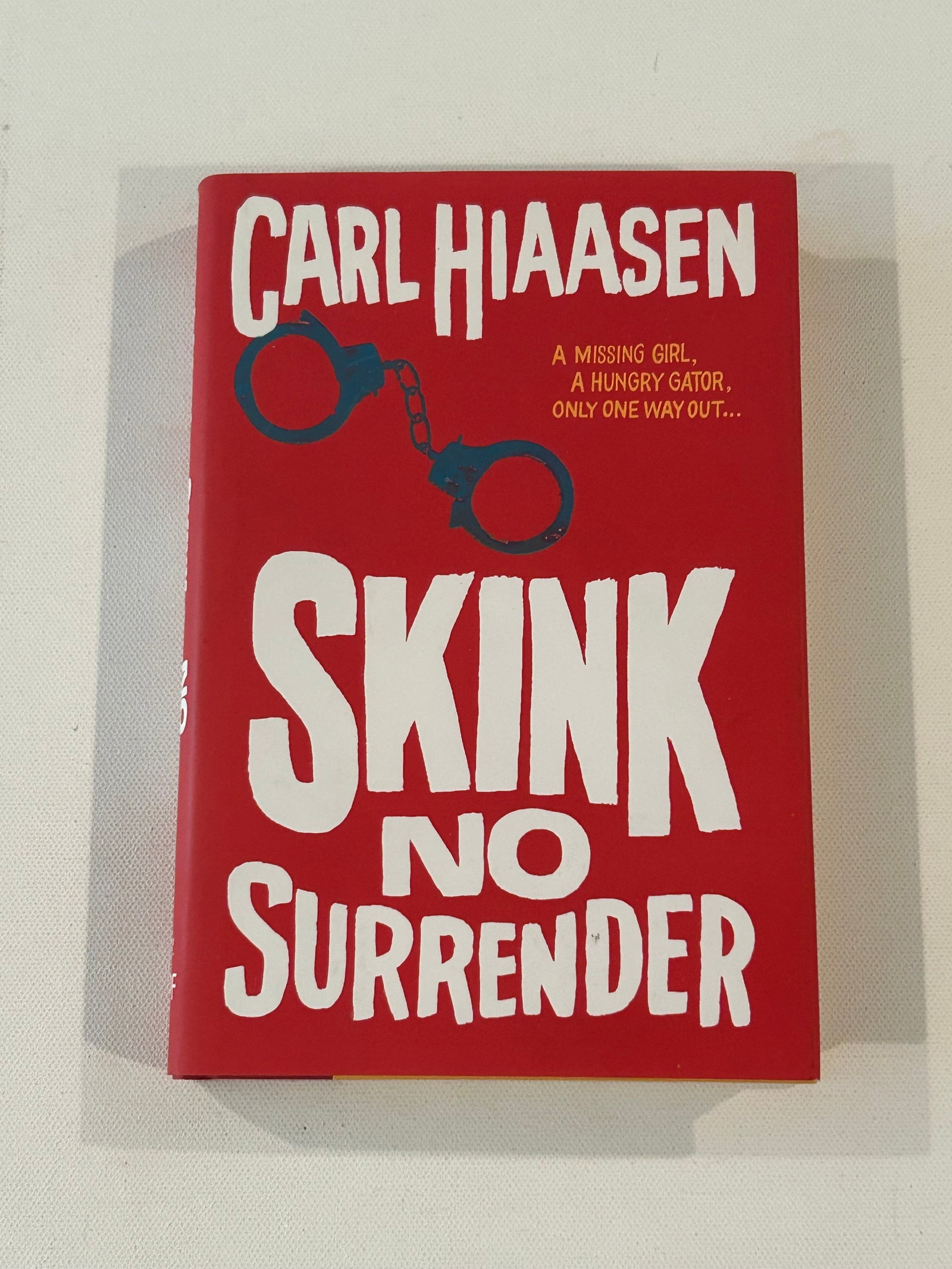 Skink No Surrender by Carl Hiaasen SIGNED First Edition: Skink No Surrender by Carl Hiaasen SIGNED First Edition published by Alfred A. Knopf, New York, 2014. Dimensions: 11" x 9" x 3"