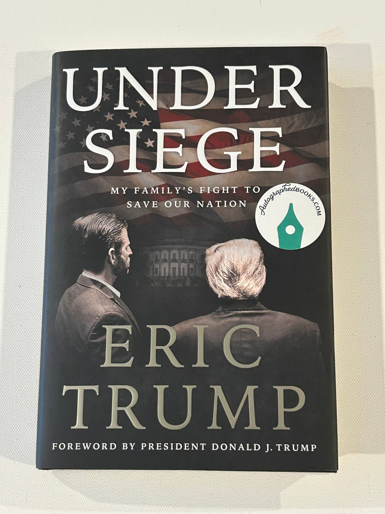 Under Siege by Eric Trump SIGNED First Edition: Under Siege My Family's Fight To Save Our Nation by Eric Trump SIGNED First Edition published by Threshold Editions, New York 2025. Dimensions: 11" x 9" x 3"