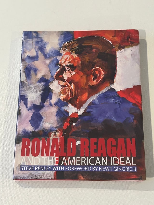 Ronald Reagan And The American Ideal by Steve Penley SIGNED & inscribed First Edition: Ronald Reagan And The American Ideal by Steve Penley SIGNED & inscribed First Edition published by Looking Glass Books, Decatur, 2010. Dimensions: 12" x 10" x 3"