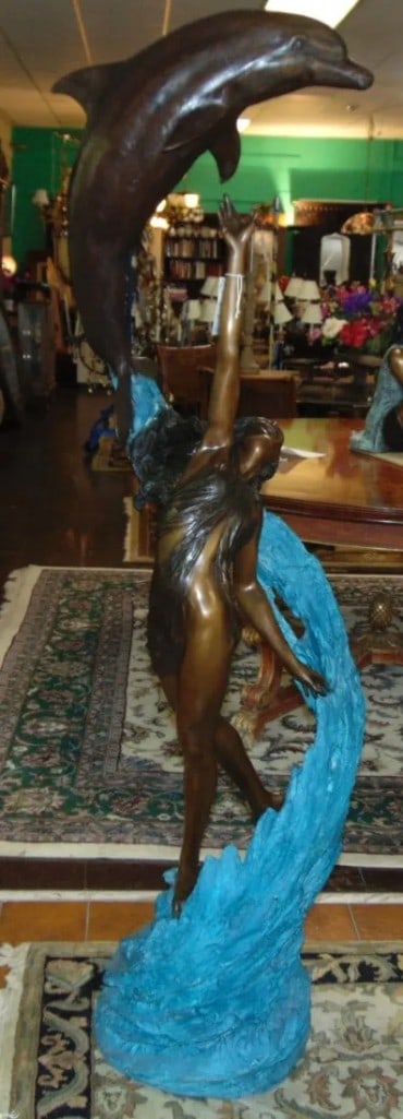 Magnificent Bronze Woman and Dolphin Fountain Sculpture: Magnificent Bronze Woman and Dolphin Fountain Sculpture. Artist signed. High Quality Bronze with excellent Detail and patina. Sculpture functions as a fountain as well and is pre-Fitted to accept