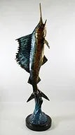 MARIUS BRONZE SAILFISH SCULPTURE: Bronze sculpture of a sailfish on round base. Signed Marius. Measures 34.25" tall 8" wide at base.