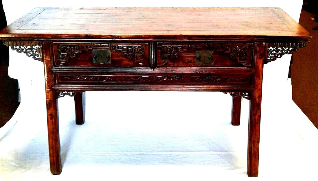 Asian Hand Carved Buffet Table: Imported, hand made alter style buffet table with two drawers. Item may have been made in China, Mongolia or some other location in Southeast Asia. Measures approximately 33.5" H x 62"W x 22.5" D