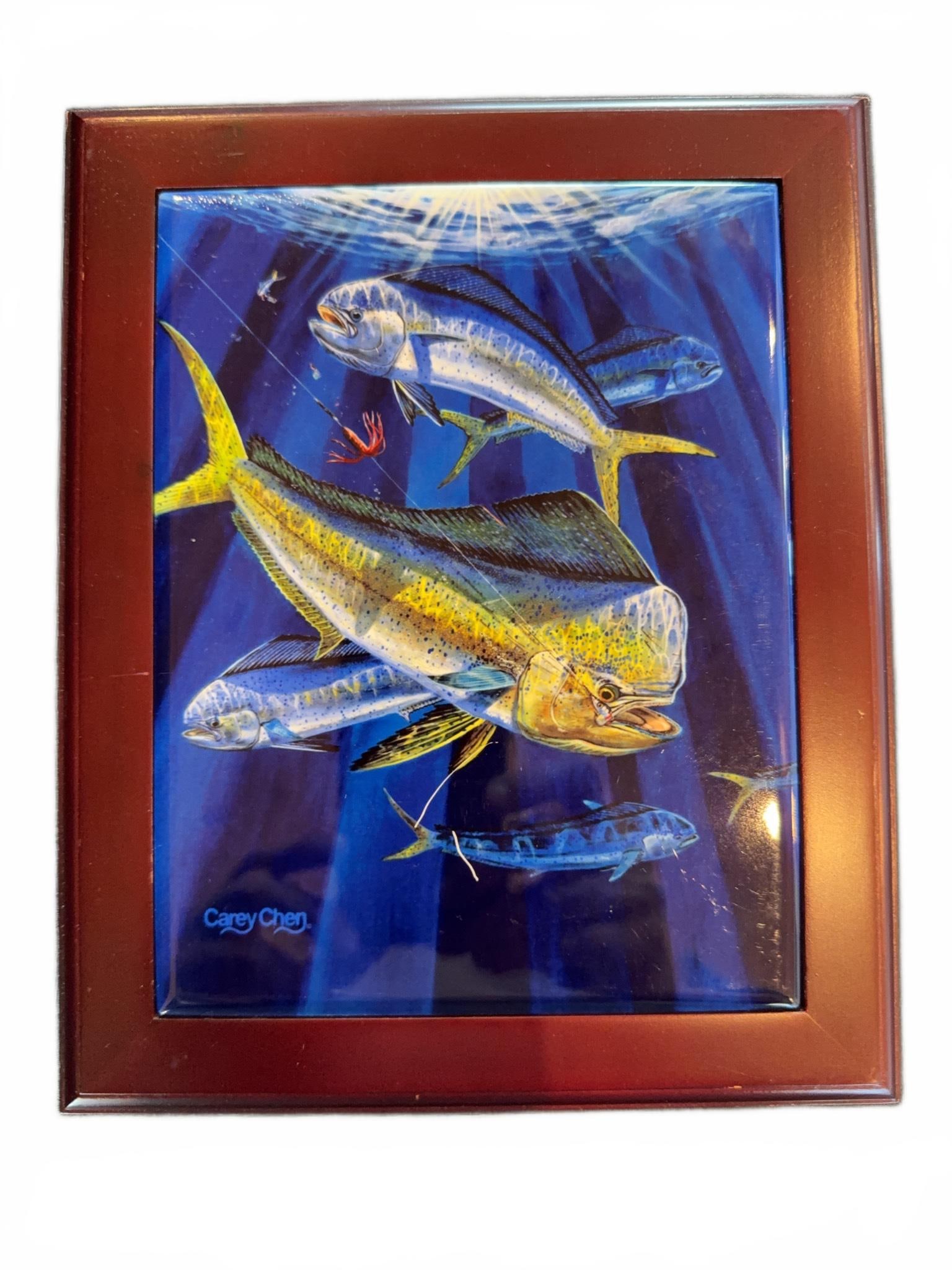 Carey Chen Framed Fish Artwork: Framed artwork featuring colorful fish, signed by artist Carey Chen. The vivid marine scene is displayed in a wooden frame, with the artist’s signature visible in the lower left corner. Ready for
