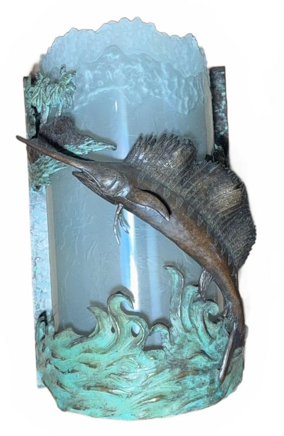 Brass Sailfish Wall Sconce With Frosted Glass Shade 2 of 2: Decorative wall sconce featuring a sailfish leaping from bronze-textured waves. The piece incorporates patinated bronze with detailed aquatic and scenic elements, and a textured frosted glass shade. S