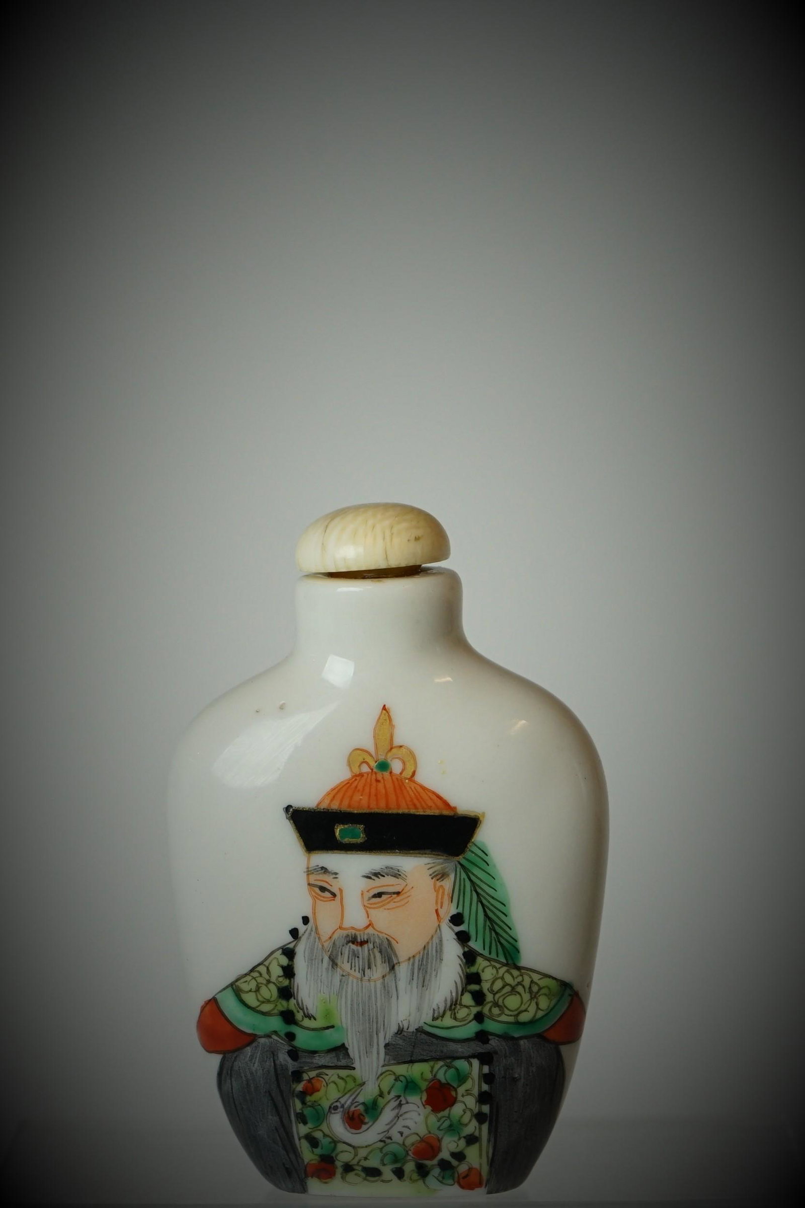 Qing Dynasty Porcelain Officer Figure Snuff Bottle. Qianlong Mark: Description · Title: Qing Dynasty Porcelain Figure Snuff Bottle,Qianlong Mark · Origin: CHINESE · Date/Period: 19c. · Material: PORCELAIN · Size: Height: 2 3/4in/7cm · Ad