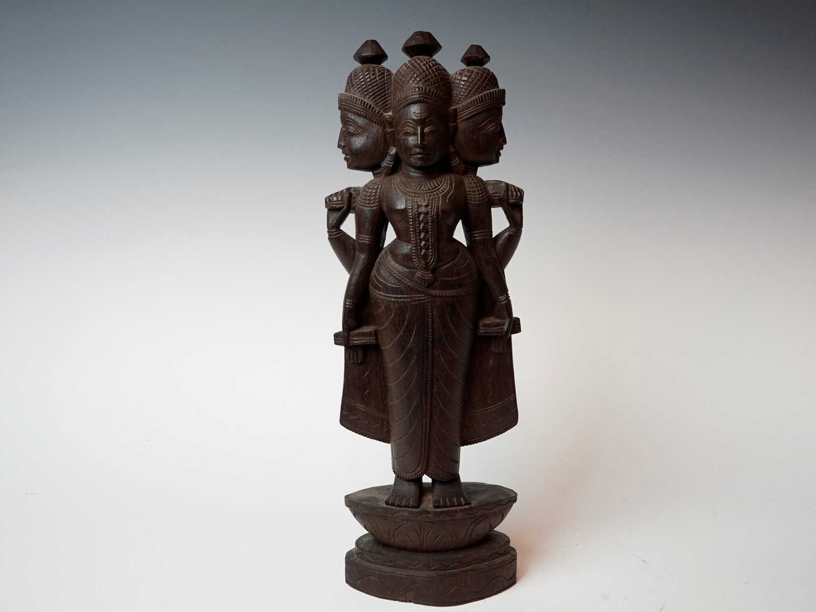 Wooden indian three headed gods statue (1 of 5)