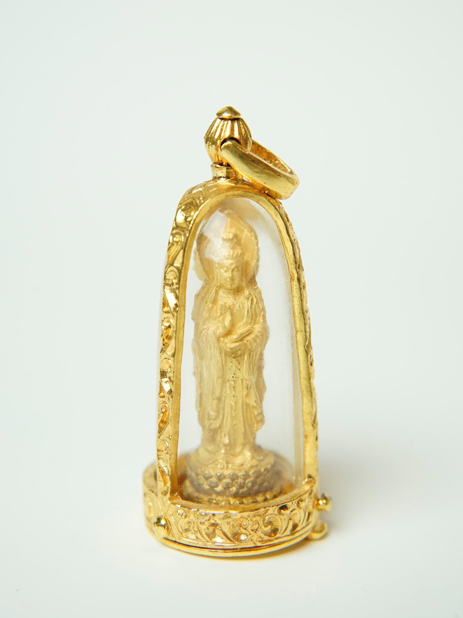 Chinese Kuanyin locket pendant: Title:Chinese Kuanyin locket pendant Date/Period: 20th C.Material: MetalSize: Height: 2in /5cm Additional Information:Fine original Chinese work. Offered in overall good condition, Surface wears, with