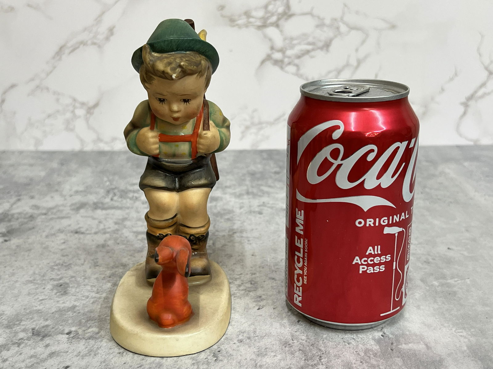 Germany Goebel Hand-painted ceramic Hummel doll: Origin:GermanyDate/Period:20TH.CMaterial:Ceramic Size:Please refer to the size of the referenceAdditional Information:German Hummel Doll, known as "the most expensive doll in the world", was born in 1