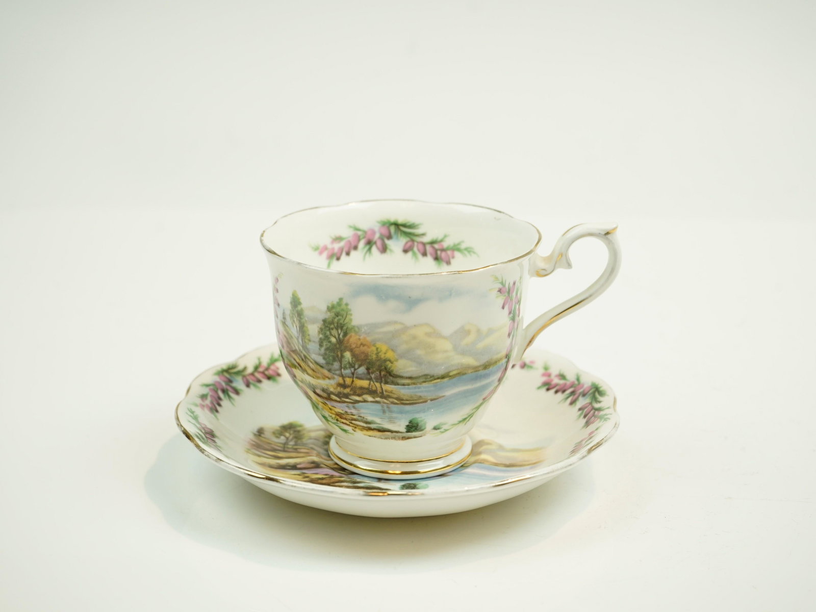 Vintage Royal Albert teacup and saucer "Road To The Isles": Origin:UK Date/Period: 20th C Material: Bone China Condition: Offered in overall good condition. Surface wears,with age and use.Please refer to the picture .LUXUR FINE ART AUCTION attempts to check ev