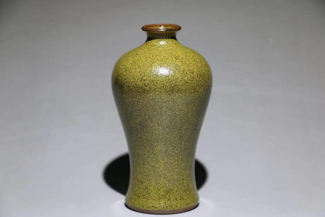 A tea dust glazed porcelain vase (1 of 9)