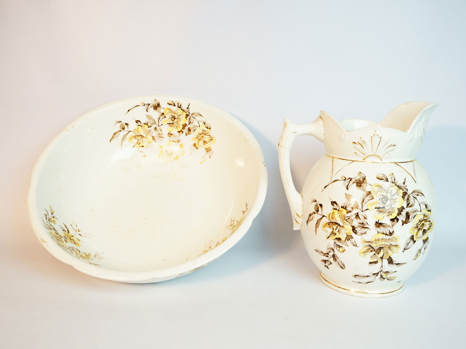 A set of vintage porcelain transferware floral pitcher and bowl ,20th c: Approximate size: bowl 5x15in/ pitcher 11x9.5x8in Shipping: We offer in-house shipping services for most small items. This means that we will take care of packing and shipping the items directly to yo